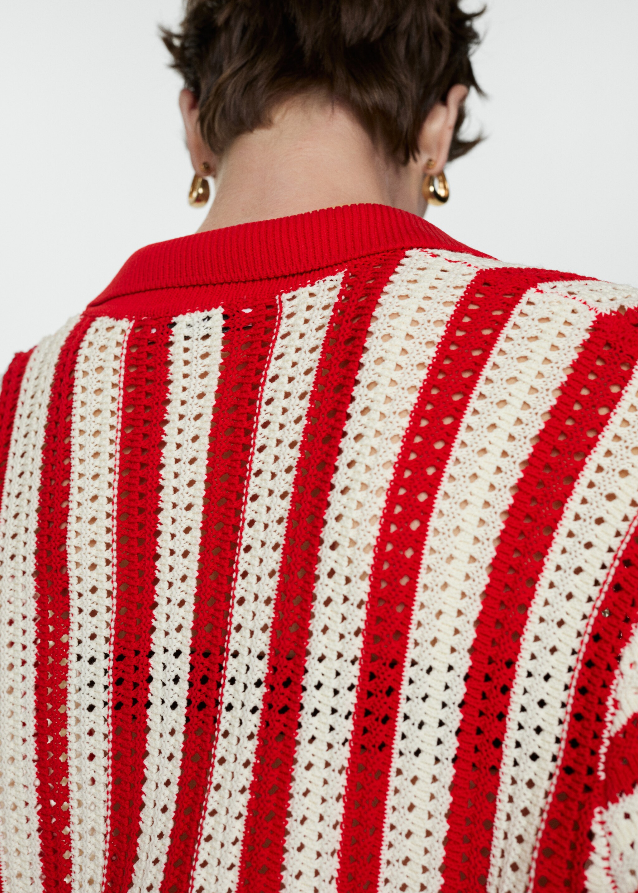 Gestreept ajour vest - Detail van het artikel 6