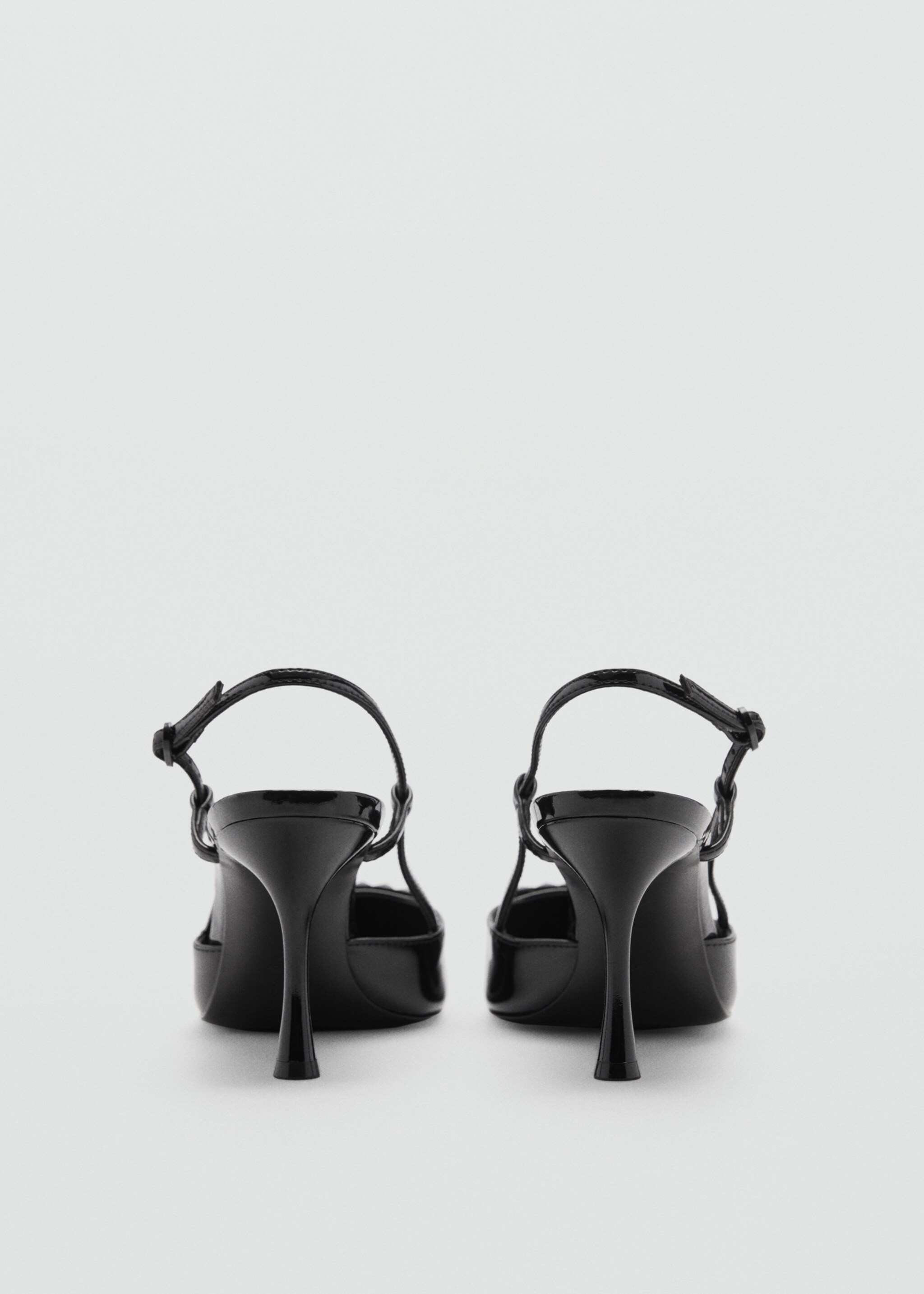 Slingpumps aus Lackleder - Detail des Artikels 1, Schwarz. Ref: 77094447-00.