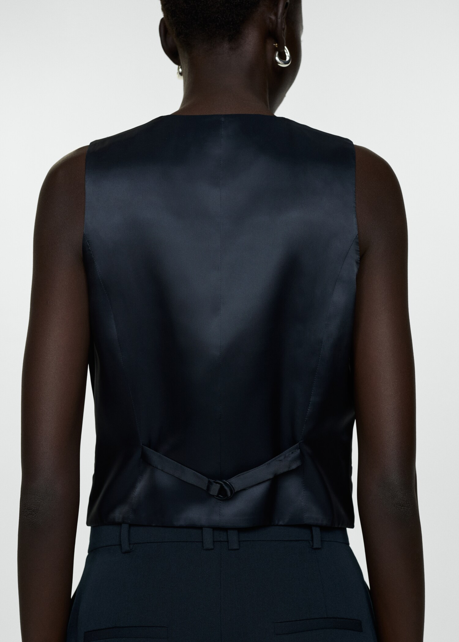 Väst med knappar - Artikelns baksida