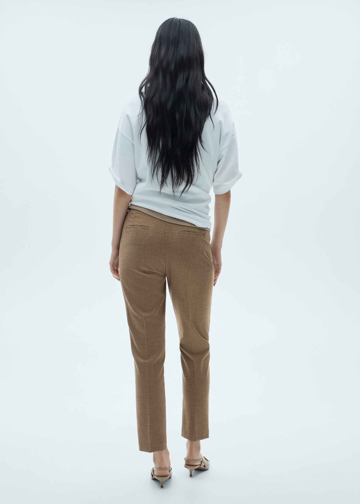 Skinny Hose mit mittelhohem Bund - Rückseite des Artikels