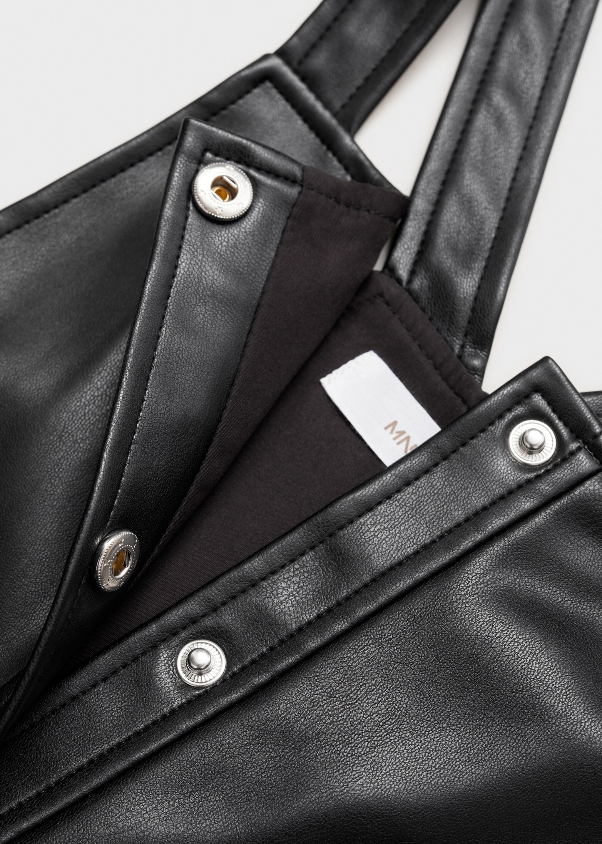 Leather-effect pinafore dress - Details of the article 0, Black. Ref: 77095970-00.