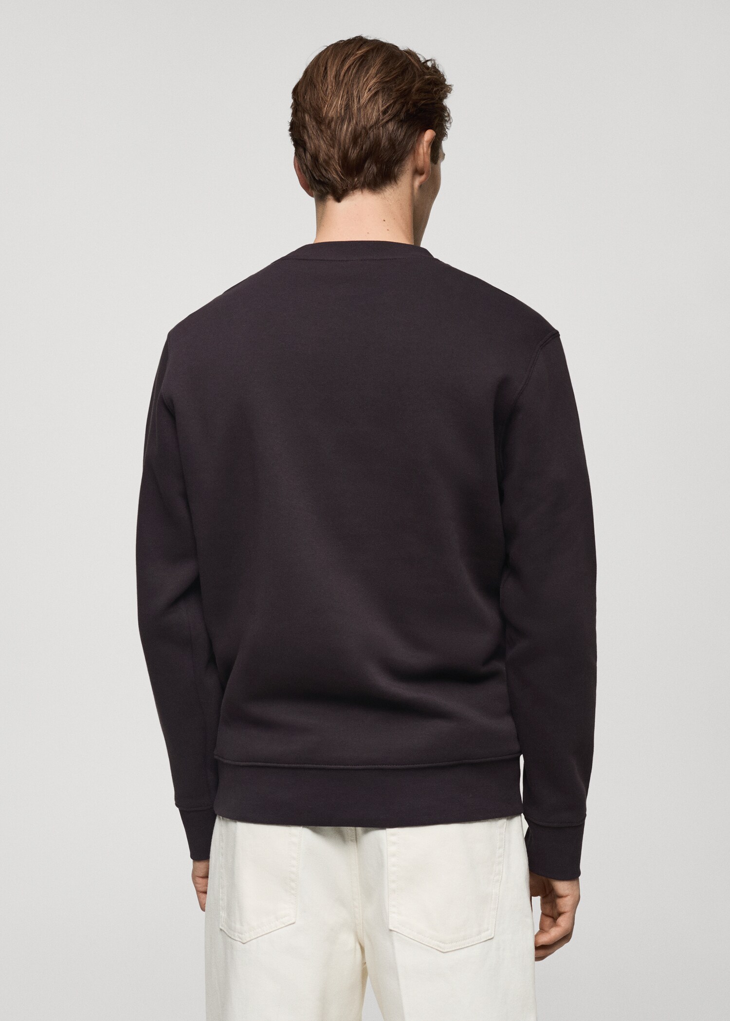 Dessuadora 100% cotó detall brodat - Revers de l'article