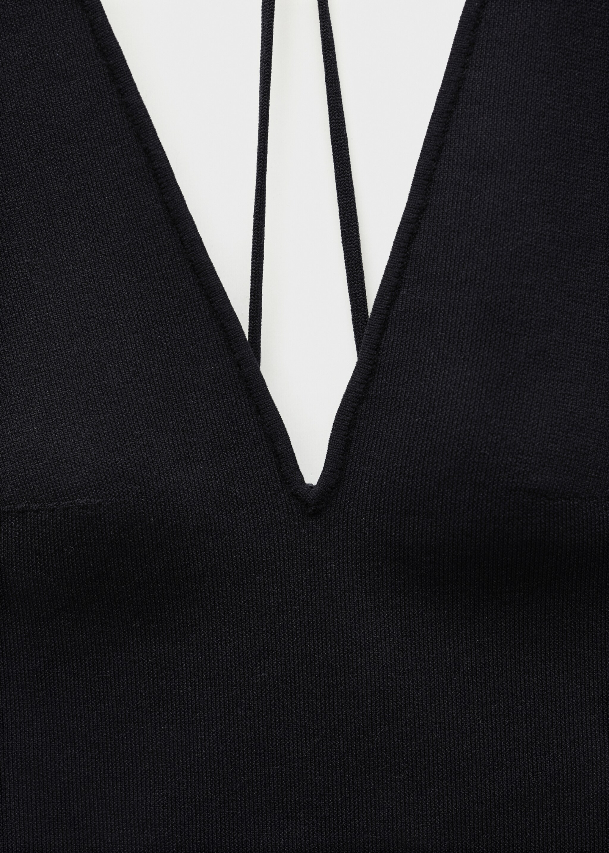 Knitted bodysuit with open back - Details of the article 8, Black. Ref: 77096746-00.