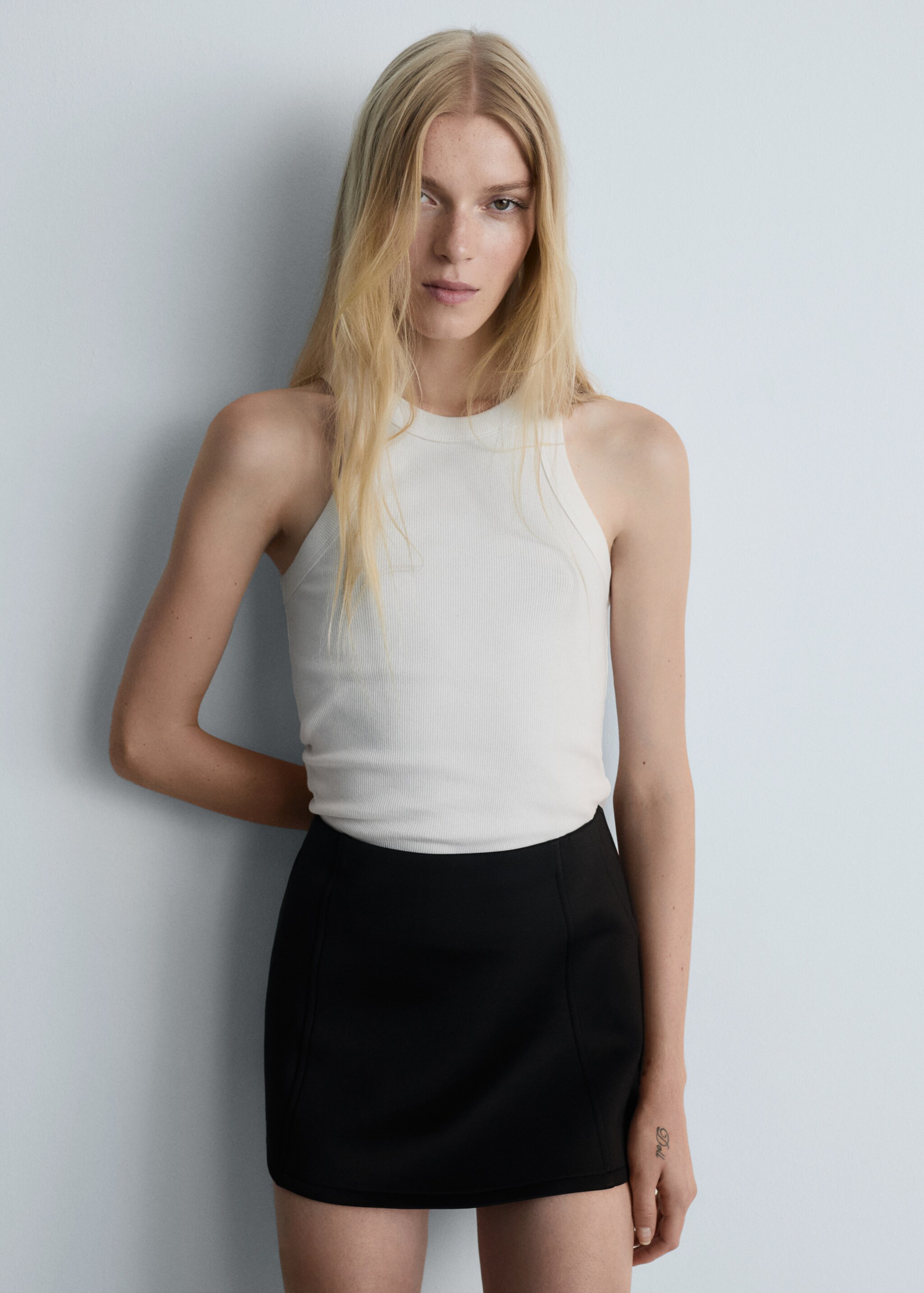 Mid-rise mini-skirt - Details of the article 1, Black. Ref: 77096755-00.