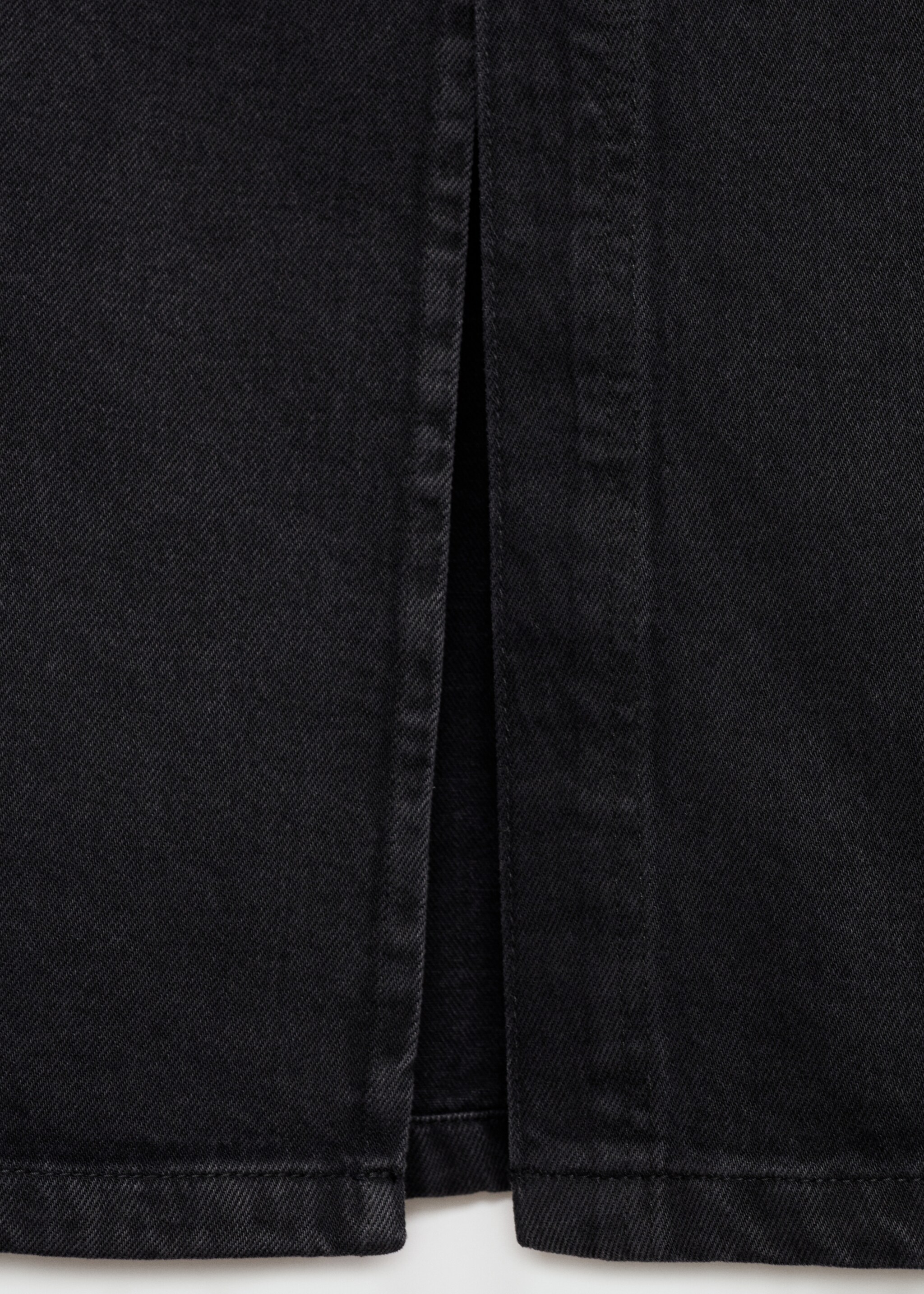 Slit denim skirt - Details of the article 8, Black denim. Ref: 77099405-00.