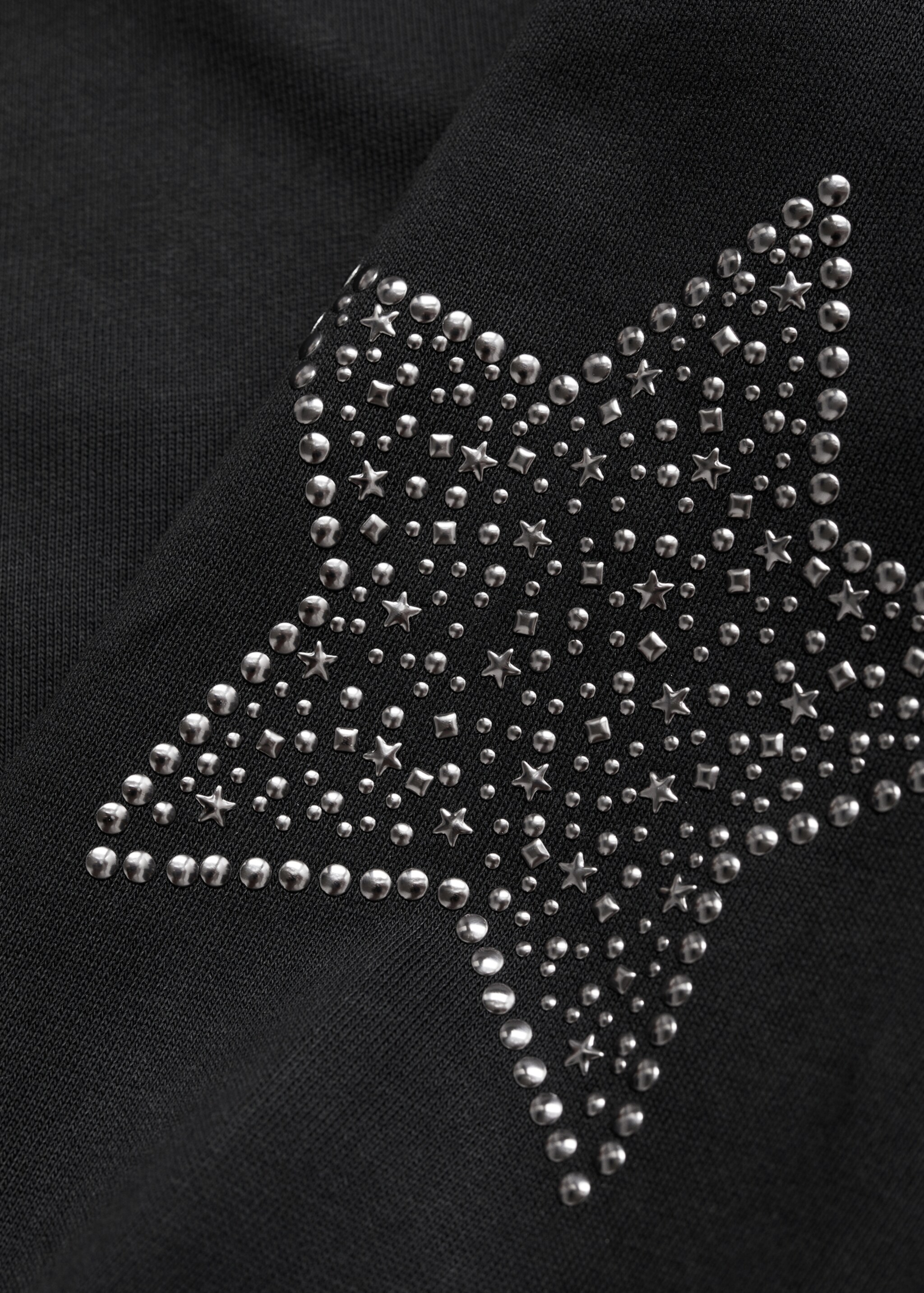 Dessuadora estrelles - Detall de l'article 8, Negre. Ref: 77976743-00.