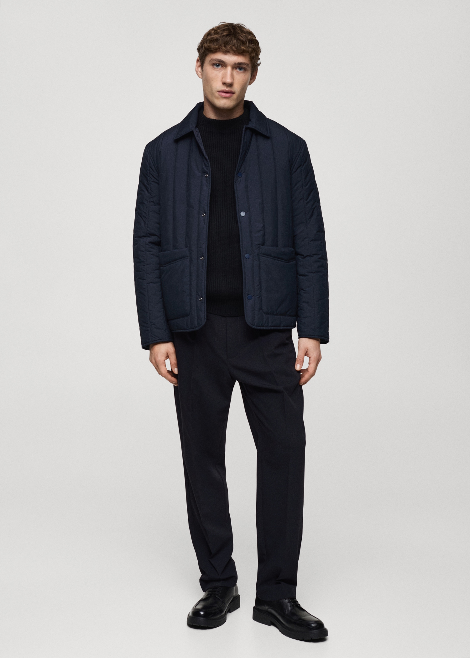 Pantalón regular fit fluido pinzas Hombre MANGO OUTLET España