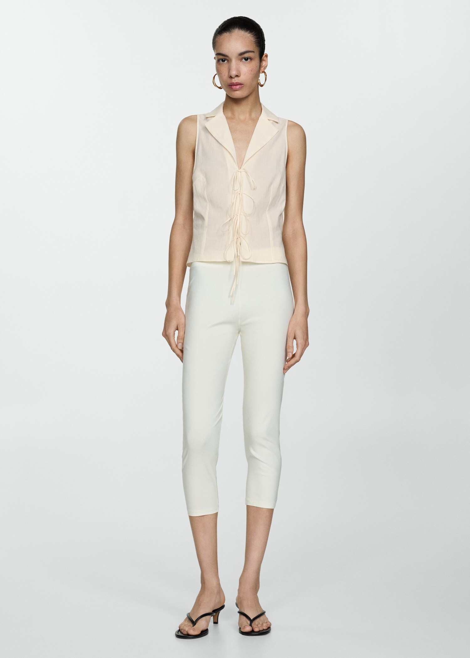 Sleeveless blouse with bows - General plane