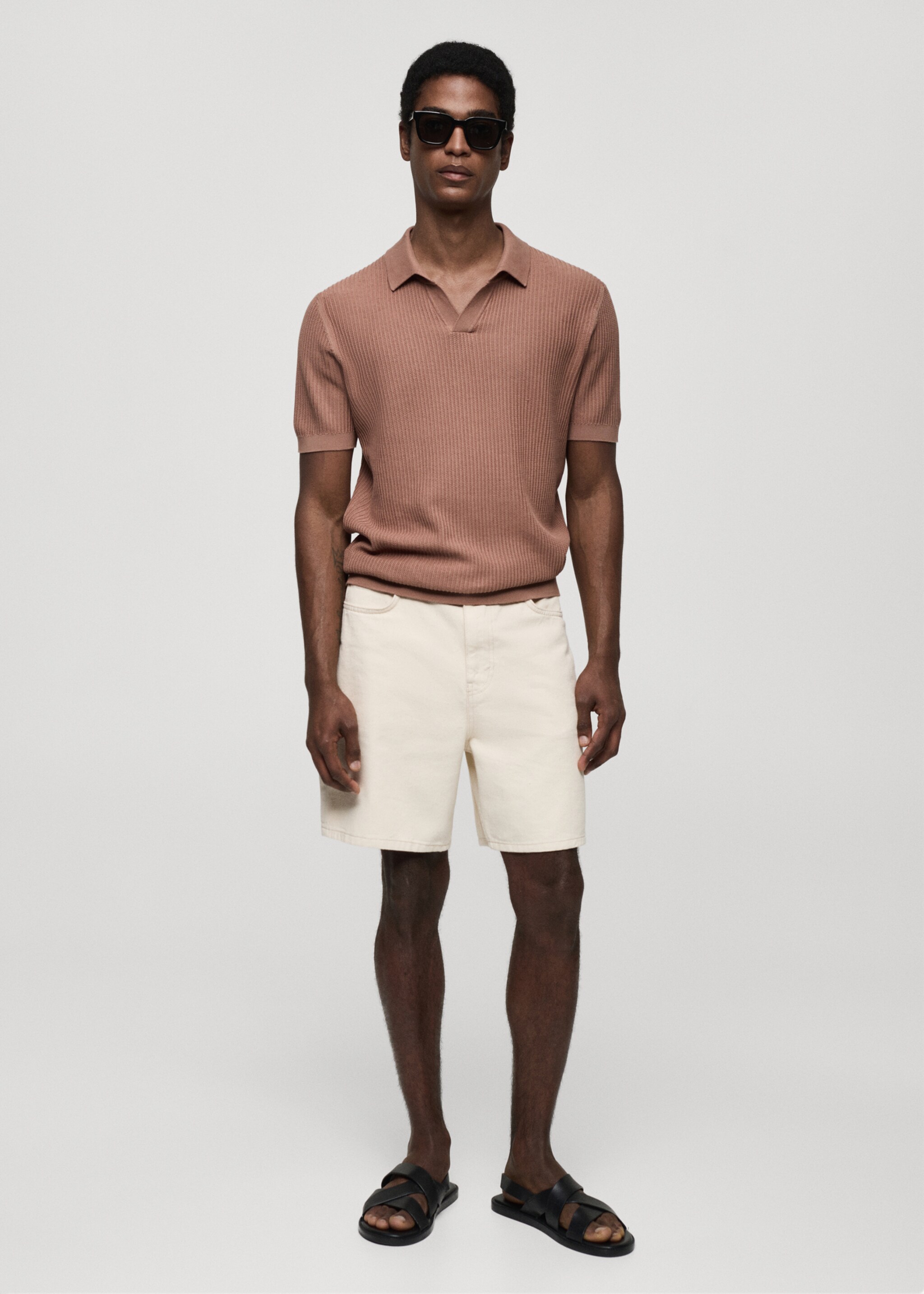 Geripptes Strick-Poloshirt aus Baumwolle - Allgemeine Ansicht