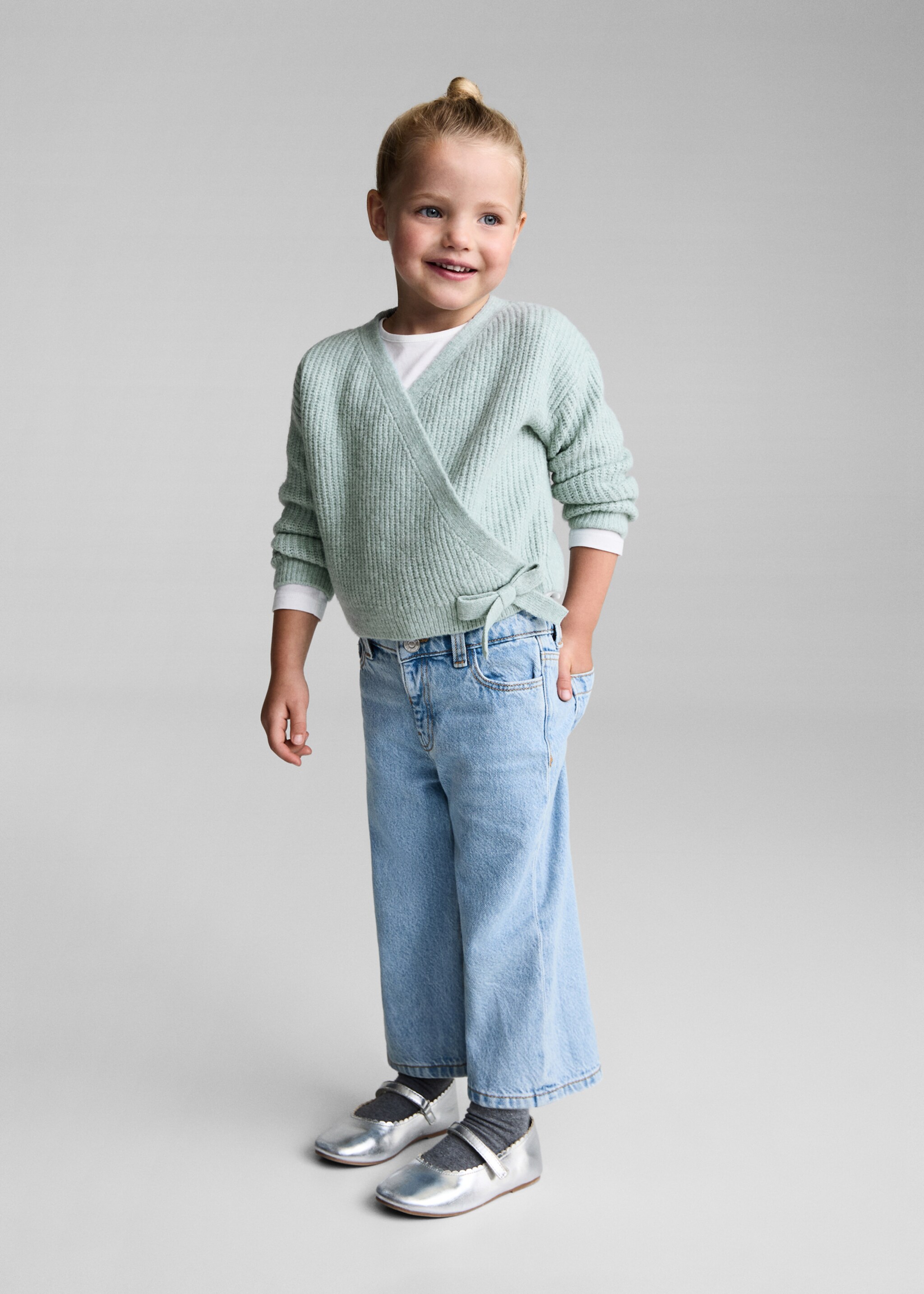 Gekruist vest met strik - Overzichtstekening, Pastelgroen. Ref: 77087712-00.