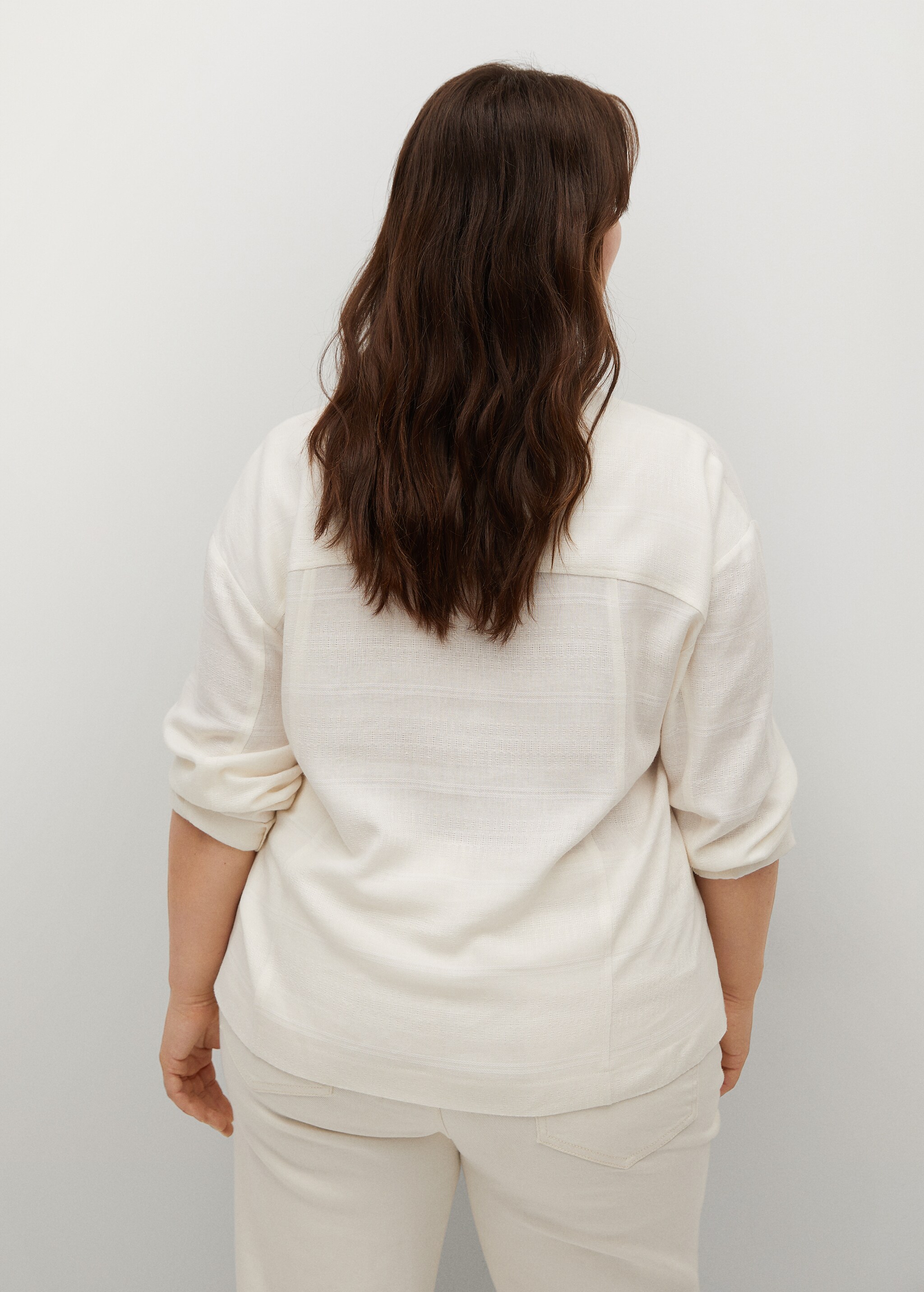 Chaqueta textura bolsillos - Reverso del artículo