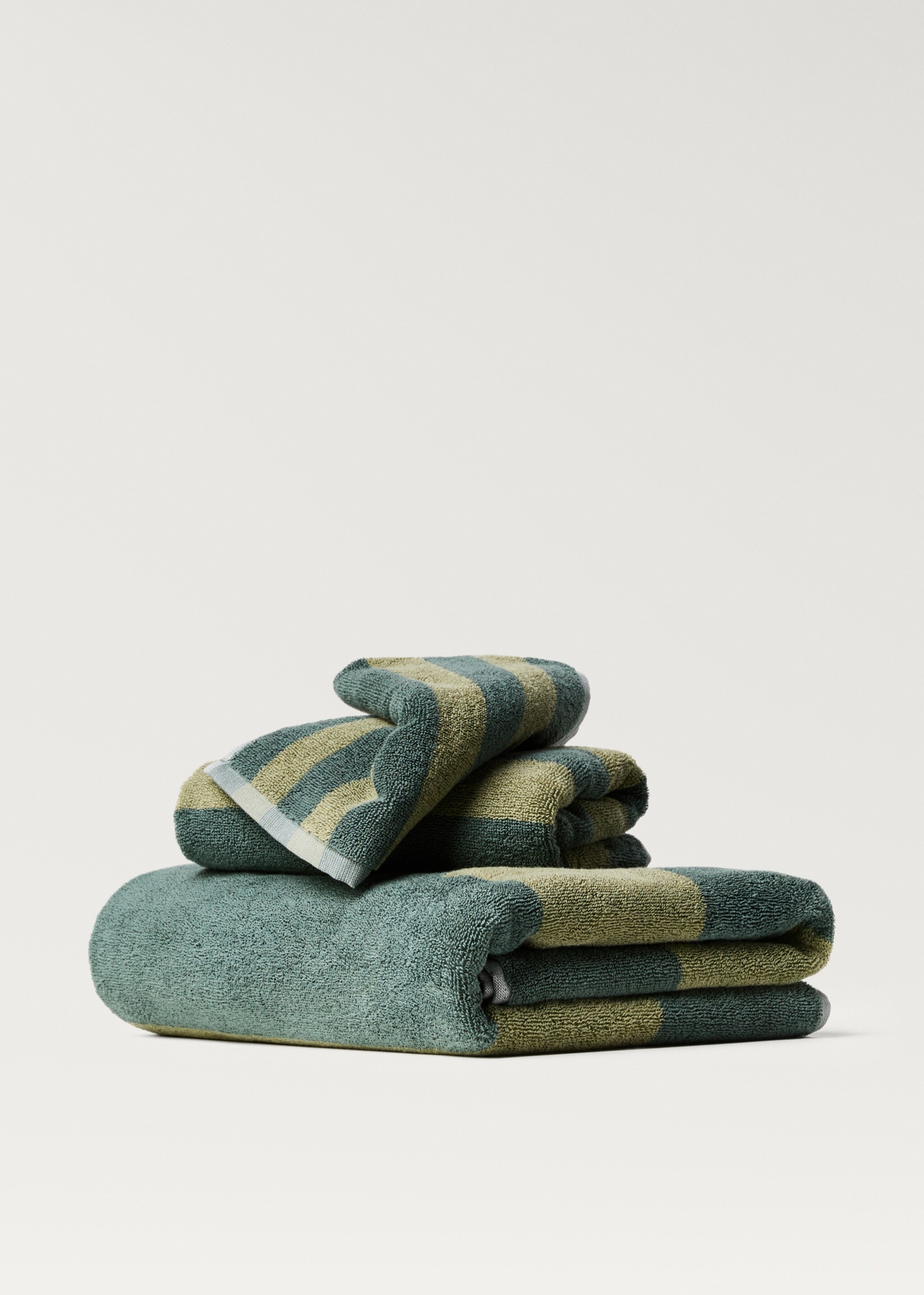Two-tone striped towel - Article without model, Green. Ref: 87003339-00.