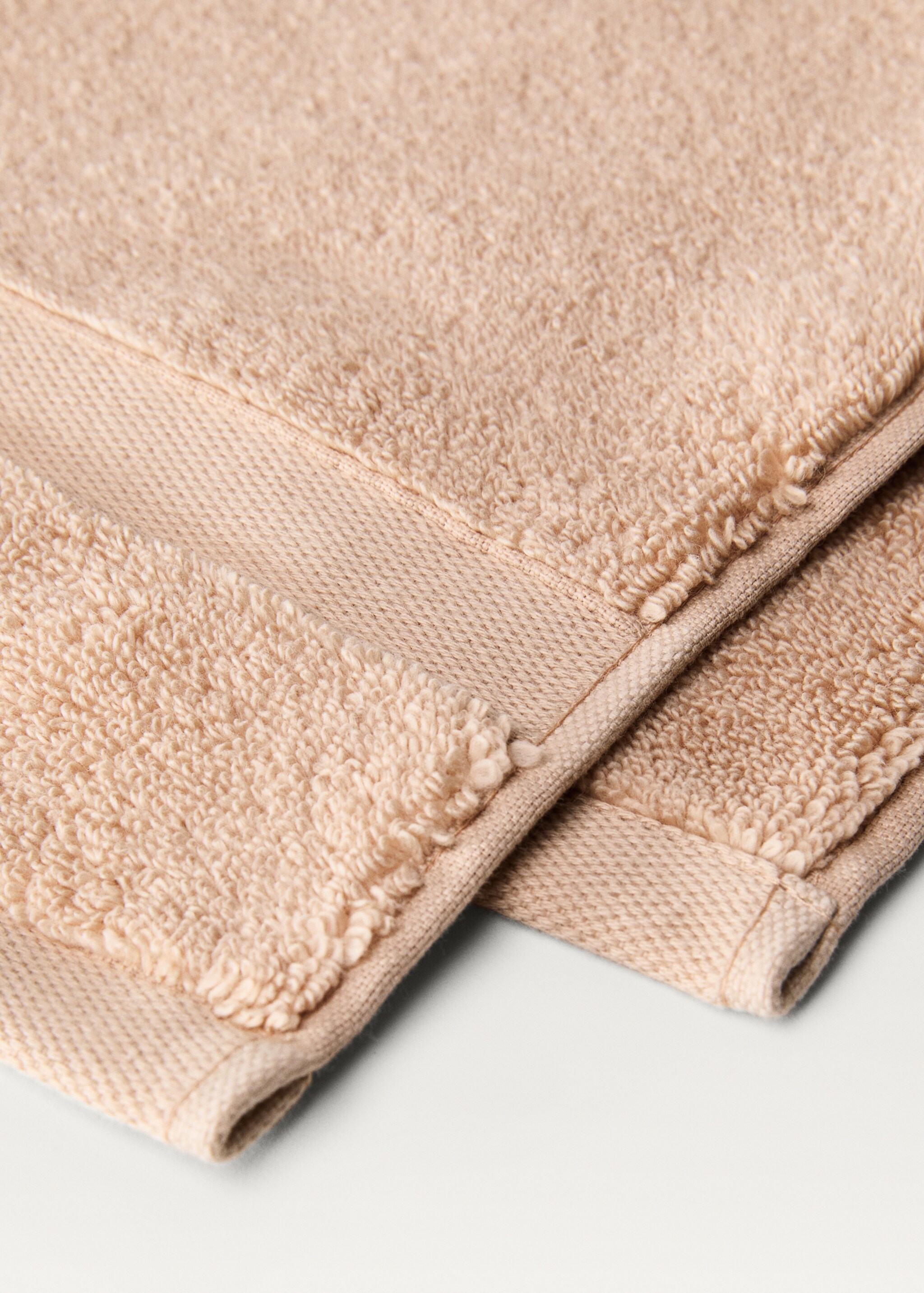 Extra-soft hand towel - Details of the article 2, Peach. Ref: 87003353-00.