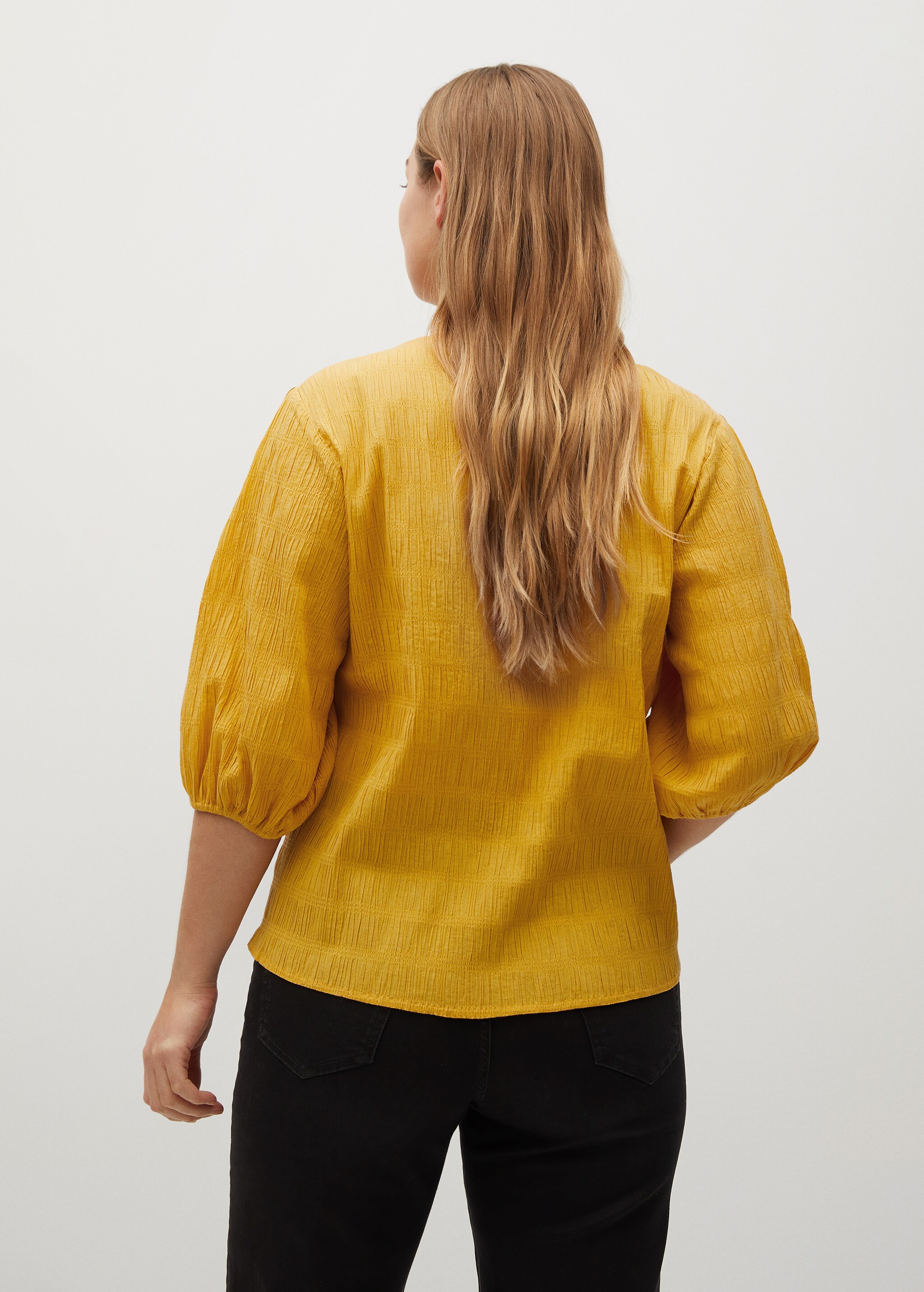 Blusa textura algodón - Reverso del artículo