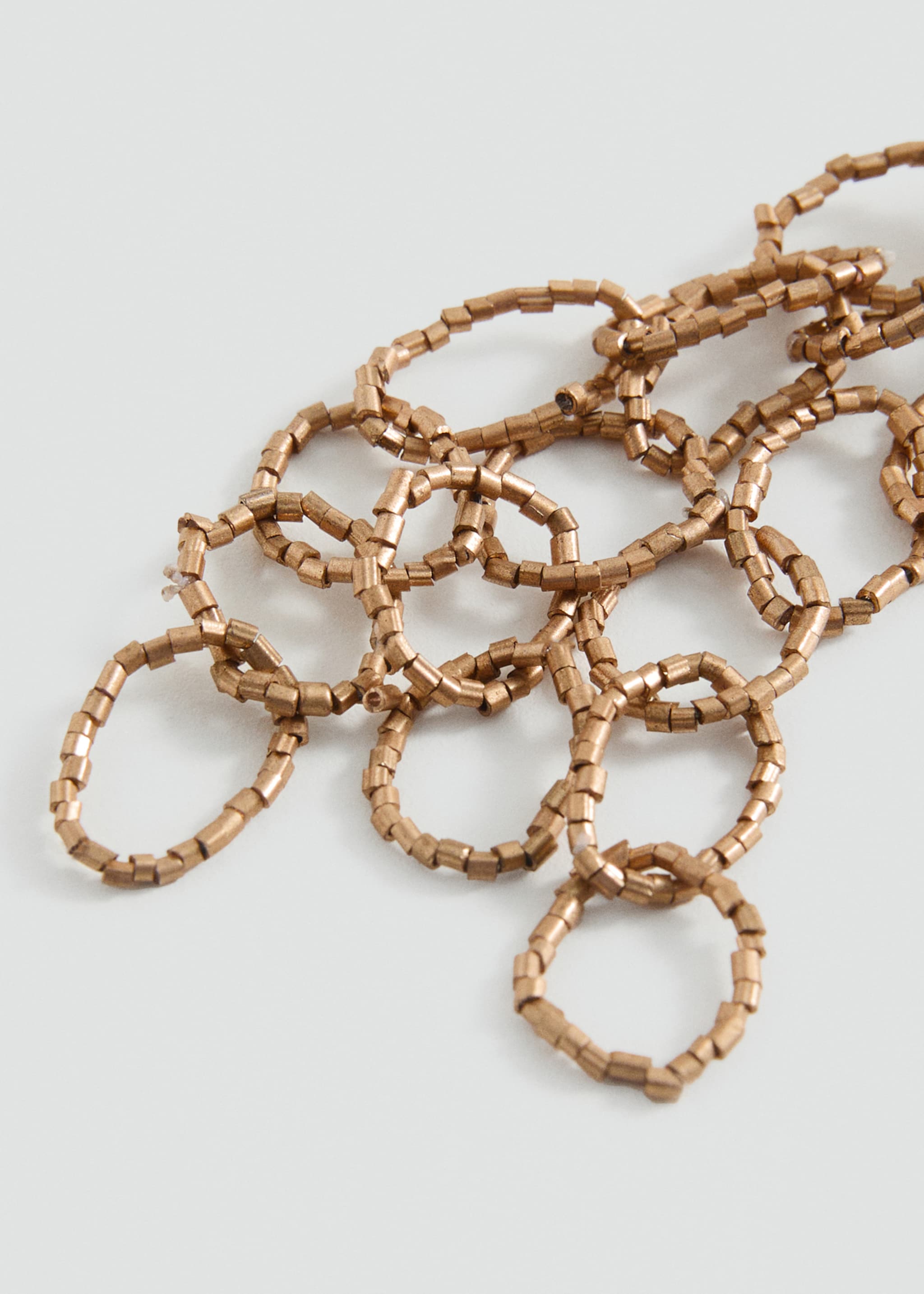 Intertwined hoop earrings - Details of the article 1, Gold. Ref: 87005988-00.