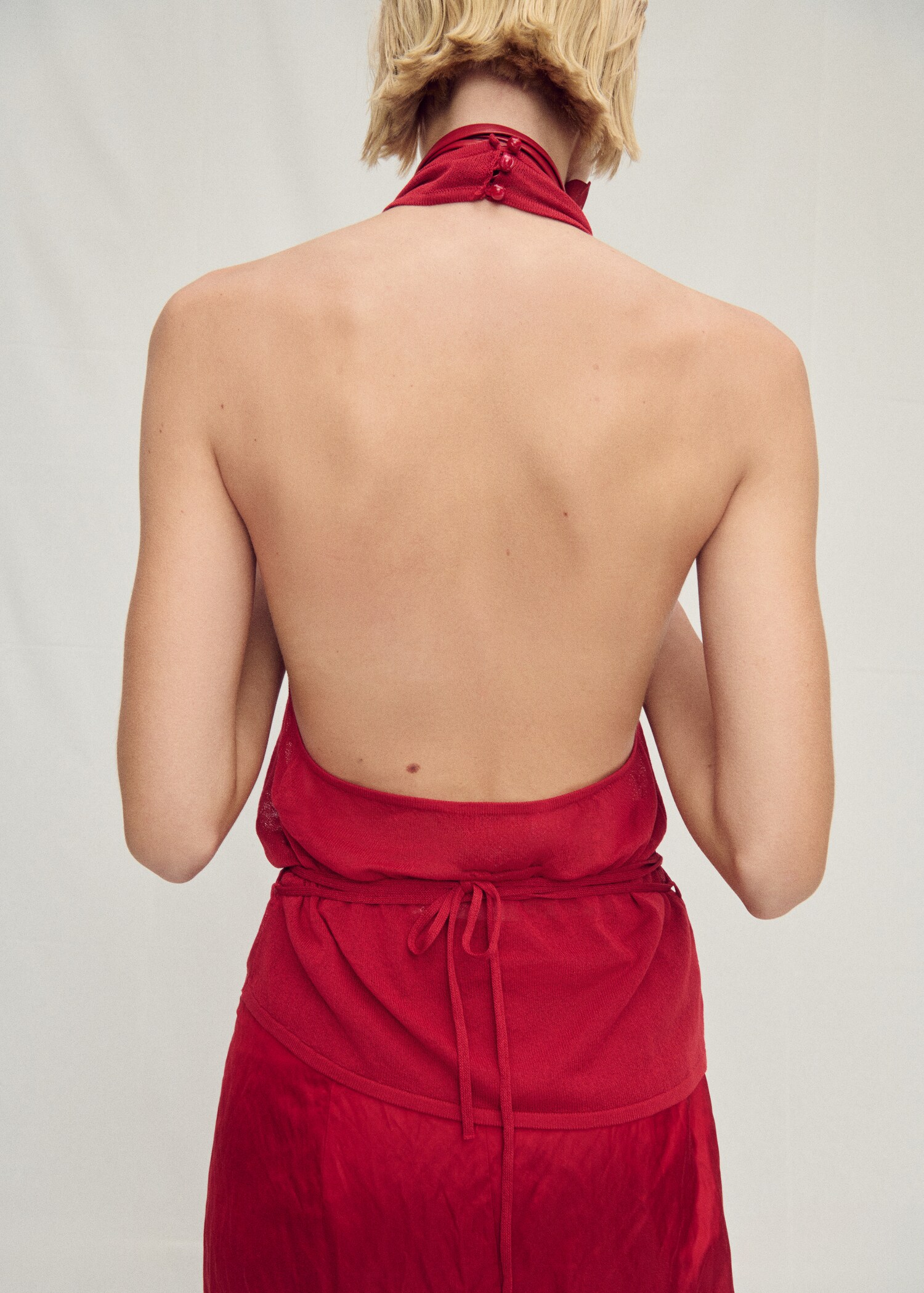 Draped knitted top with open back - Reverse of the article