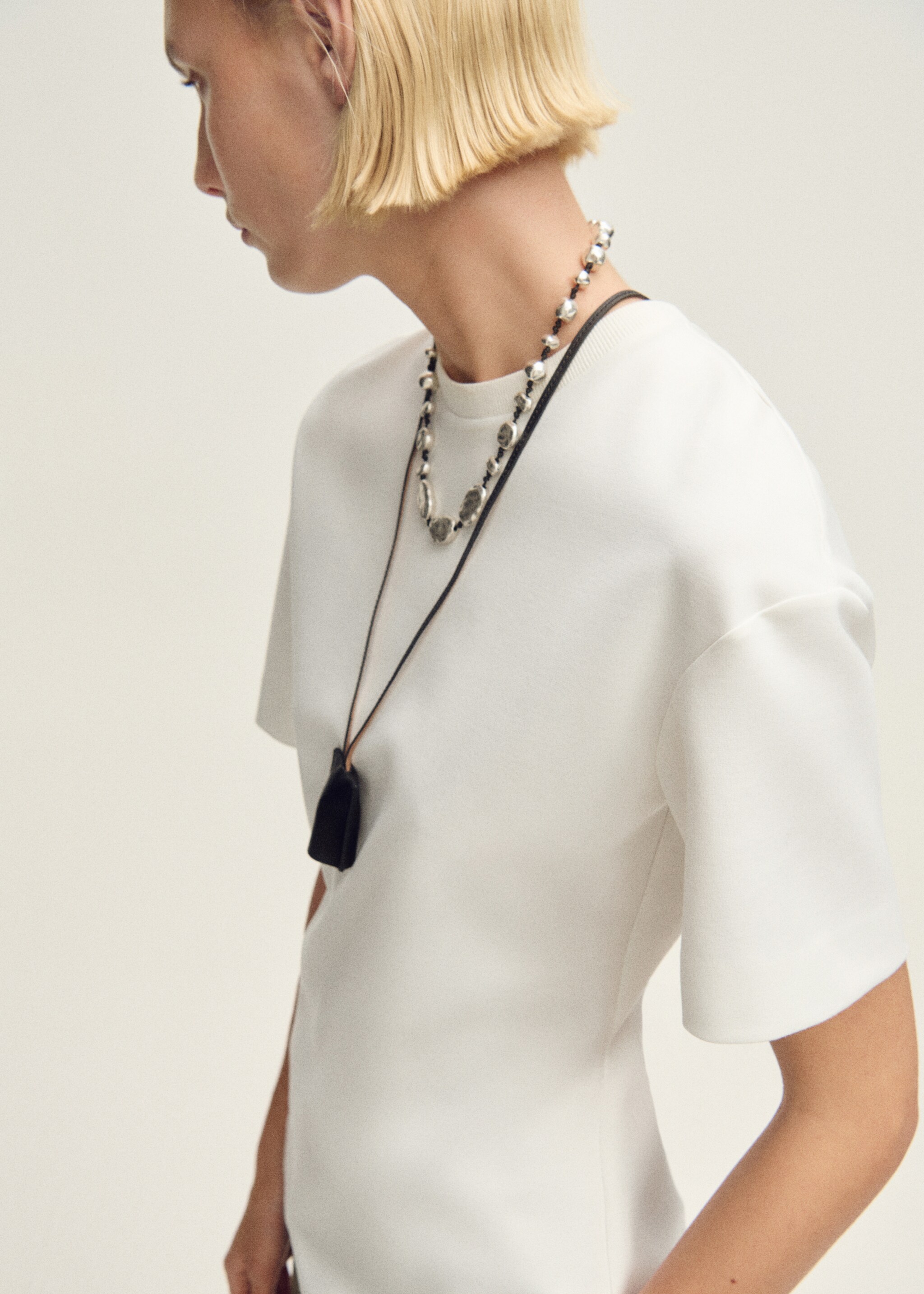 Short-sleeved peplum t-shirt - Details of the article 2, White. Ref: 87007911-00.