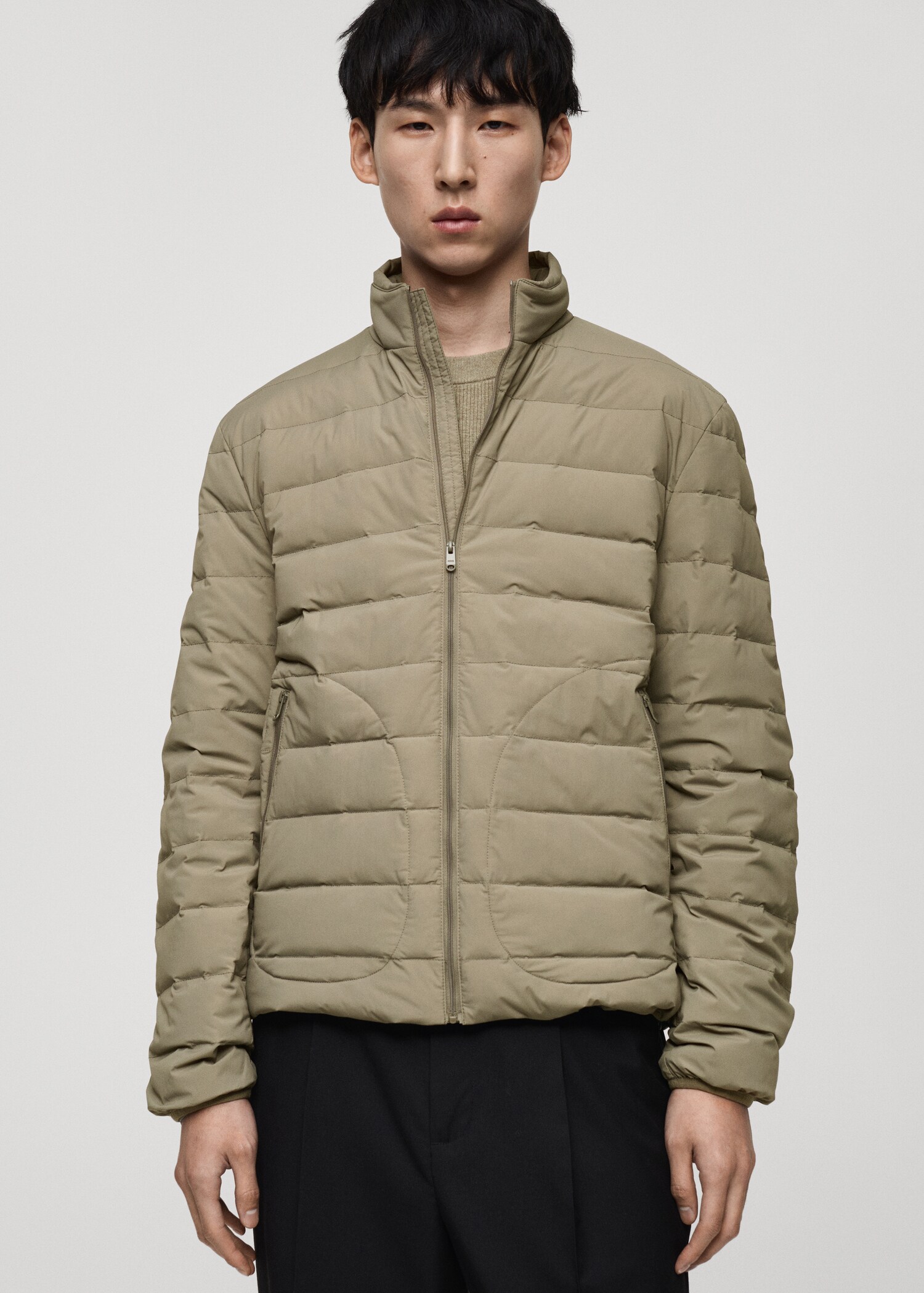 Jaqueta embuatada farcit plomissol i plomes - Pla mig