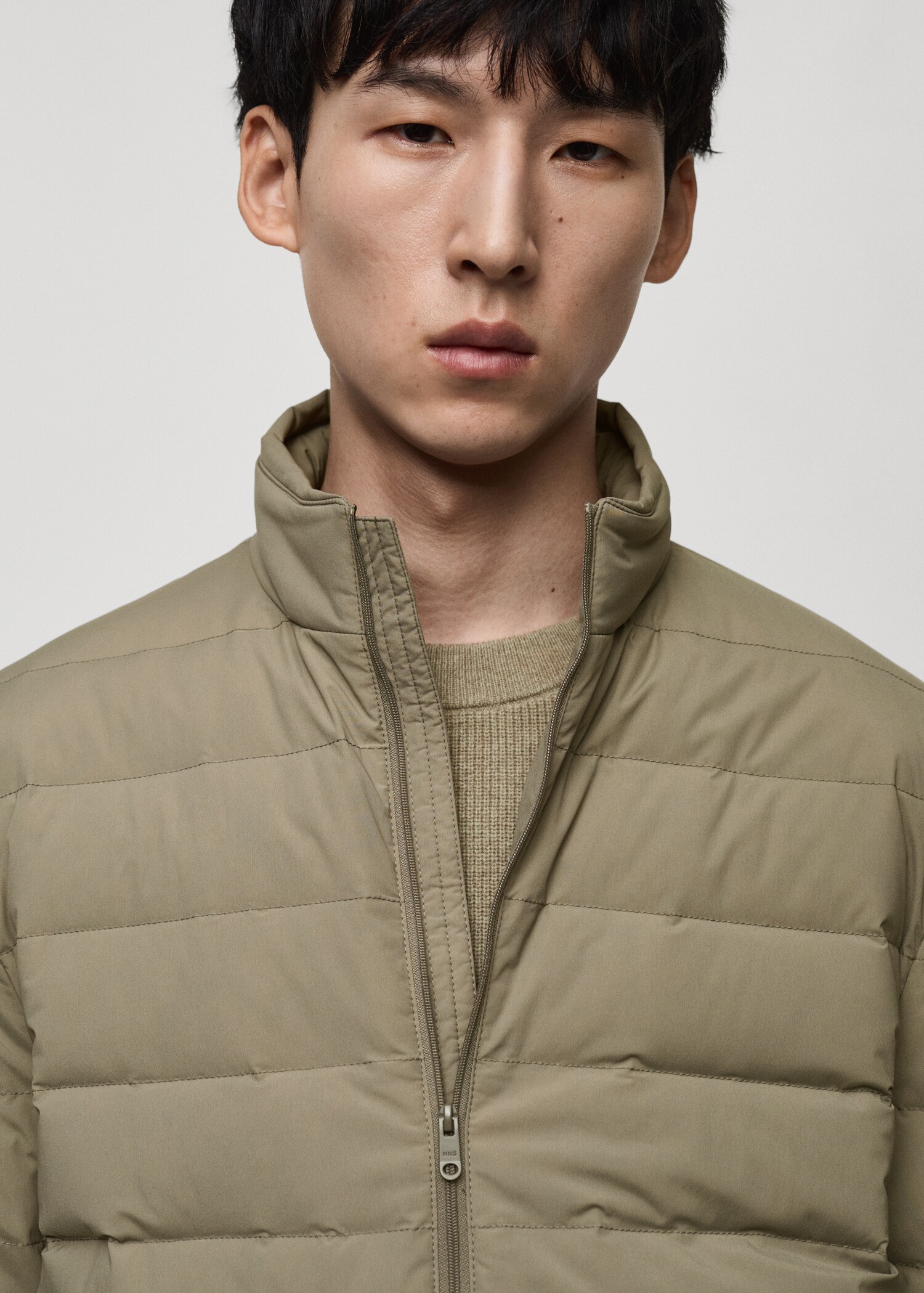 Jaqueta embuatada farcit plomissol i plomes - Detall de l'article 1