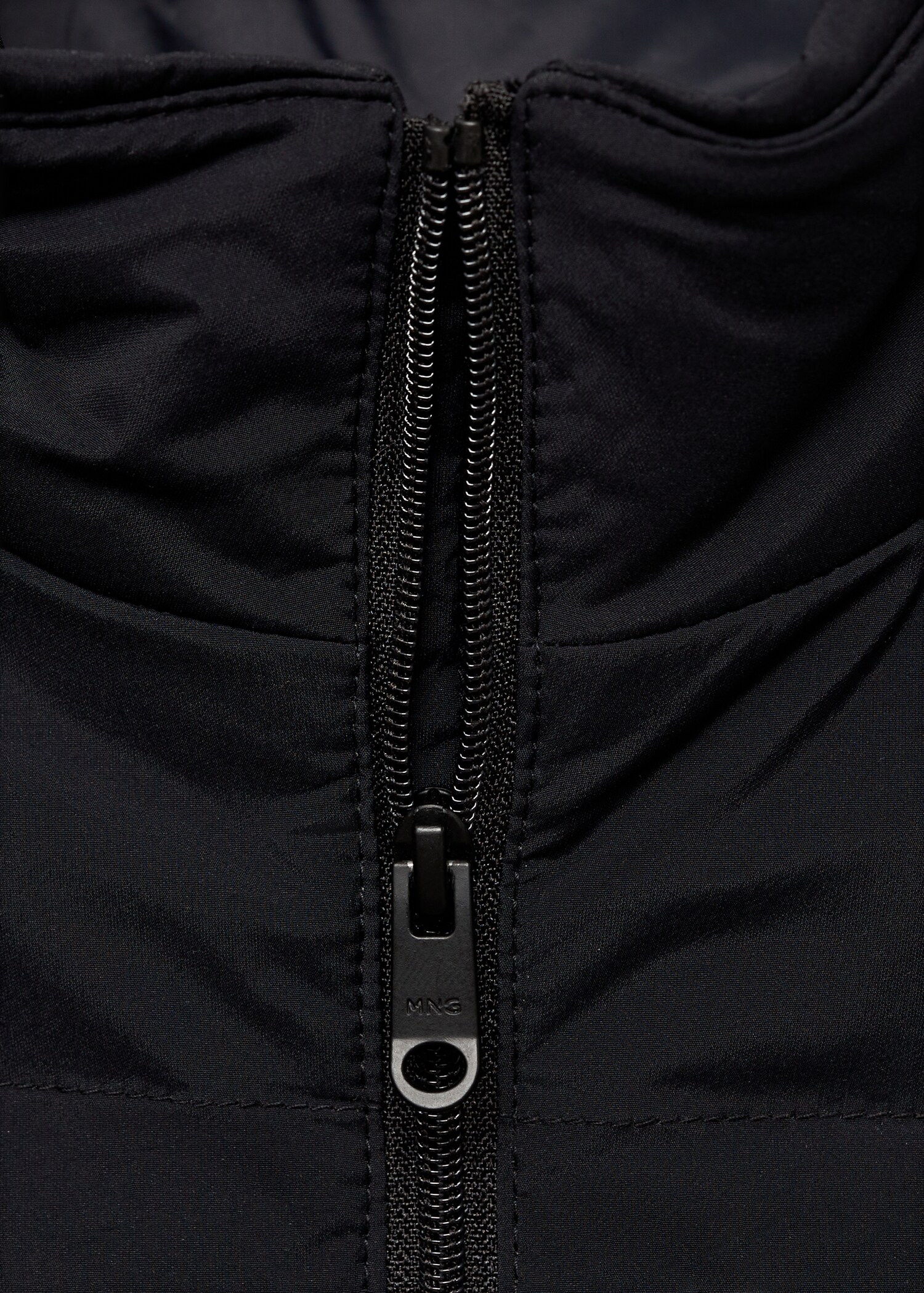 Jaqueta embuatada farcit plomissol i plomes - Detall de l'article 8