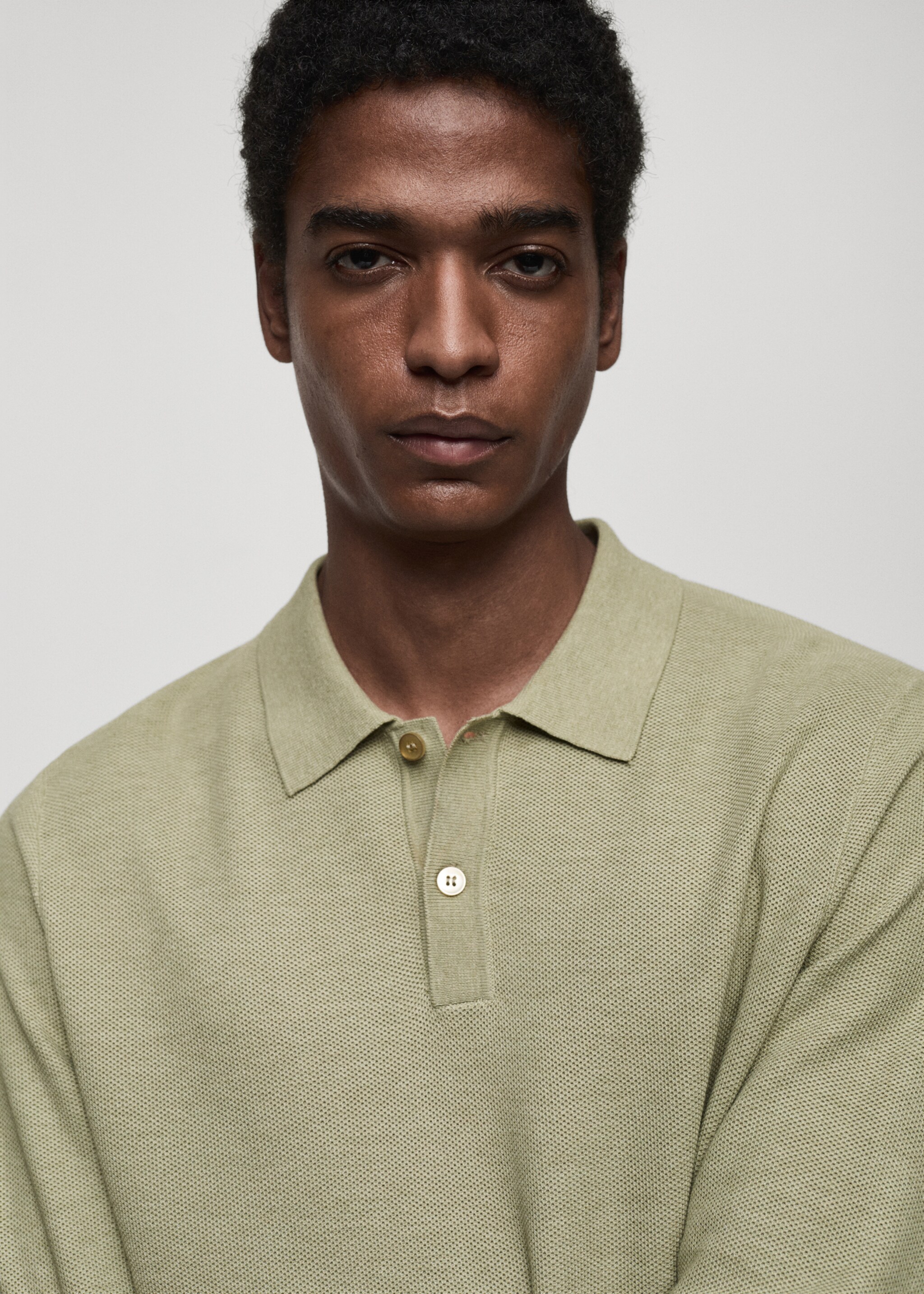 Micro-structured cotton knitted polo shirt - Details of the article 1, Green Apple. Ref: 87010601-00.
