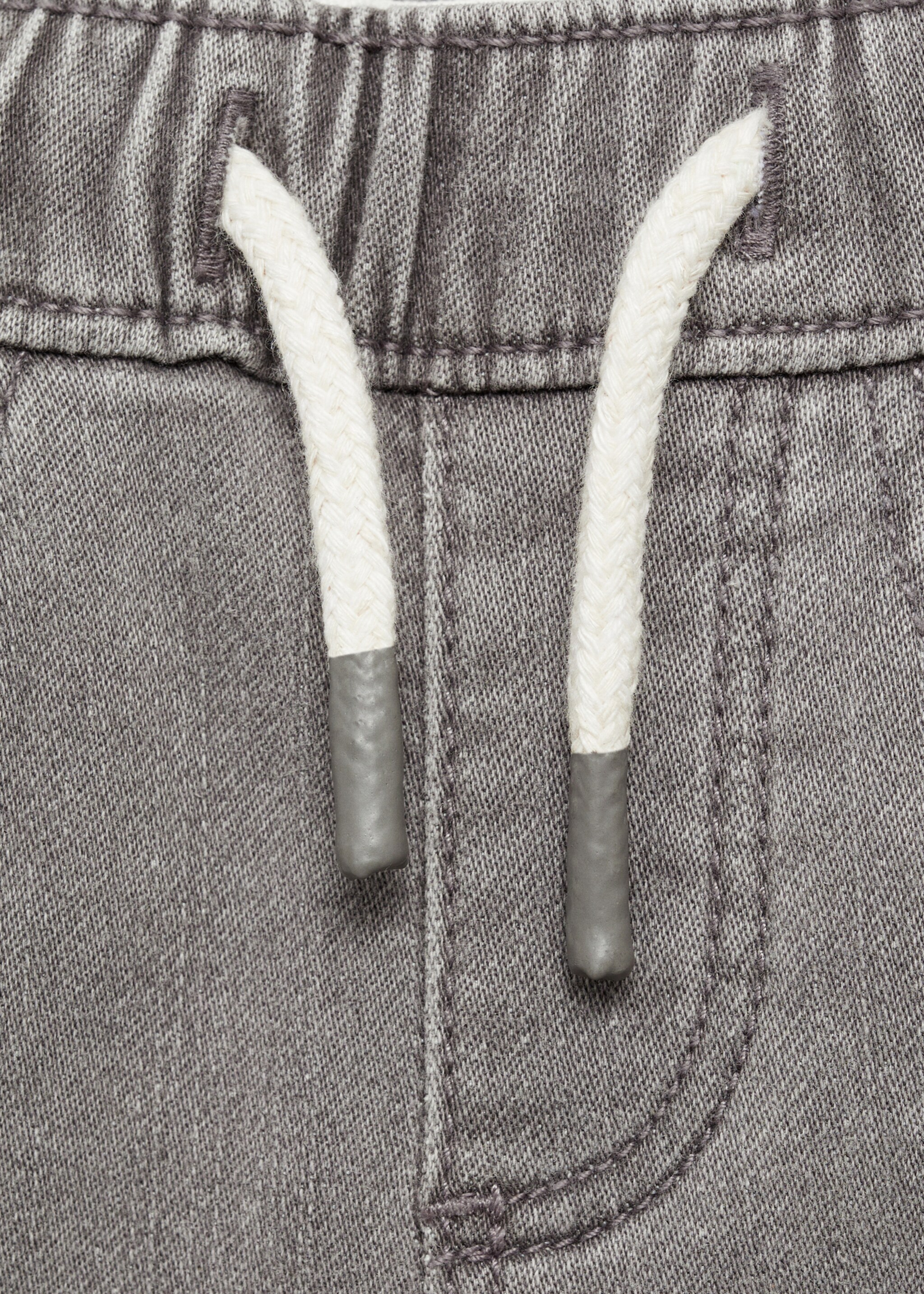 Jeans mit Stretchbund und Kordel - Detail des Artikels 8, Denim Grau. Ref: 87010623-00.