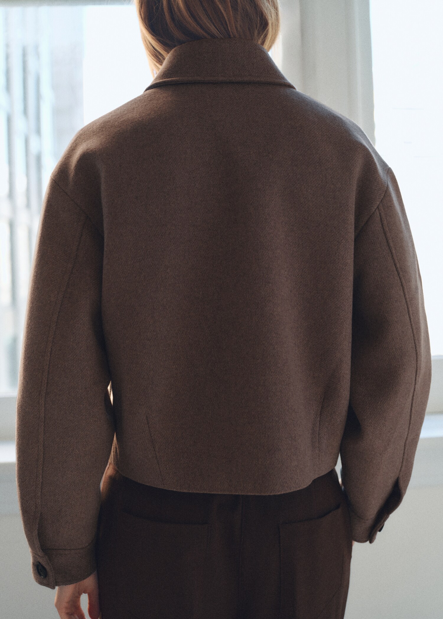 Wool jacket with pockets - Reverse of the article