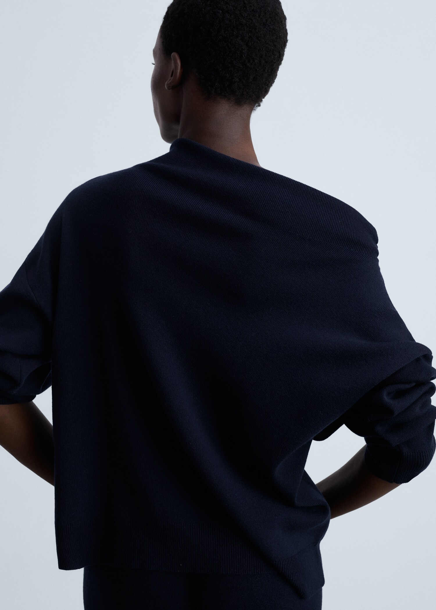 Knitted sweater with asymmetrical neck - Reverse of the article