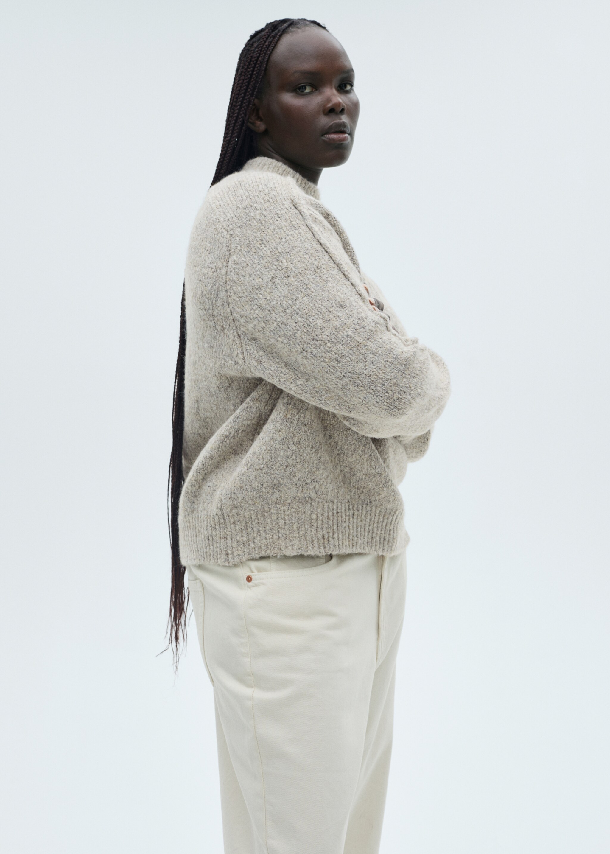 Knitted sweater with perkins neck - Details of the article 5, Sand. Ref: 87013277-00.