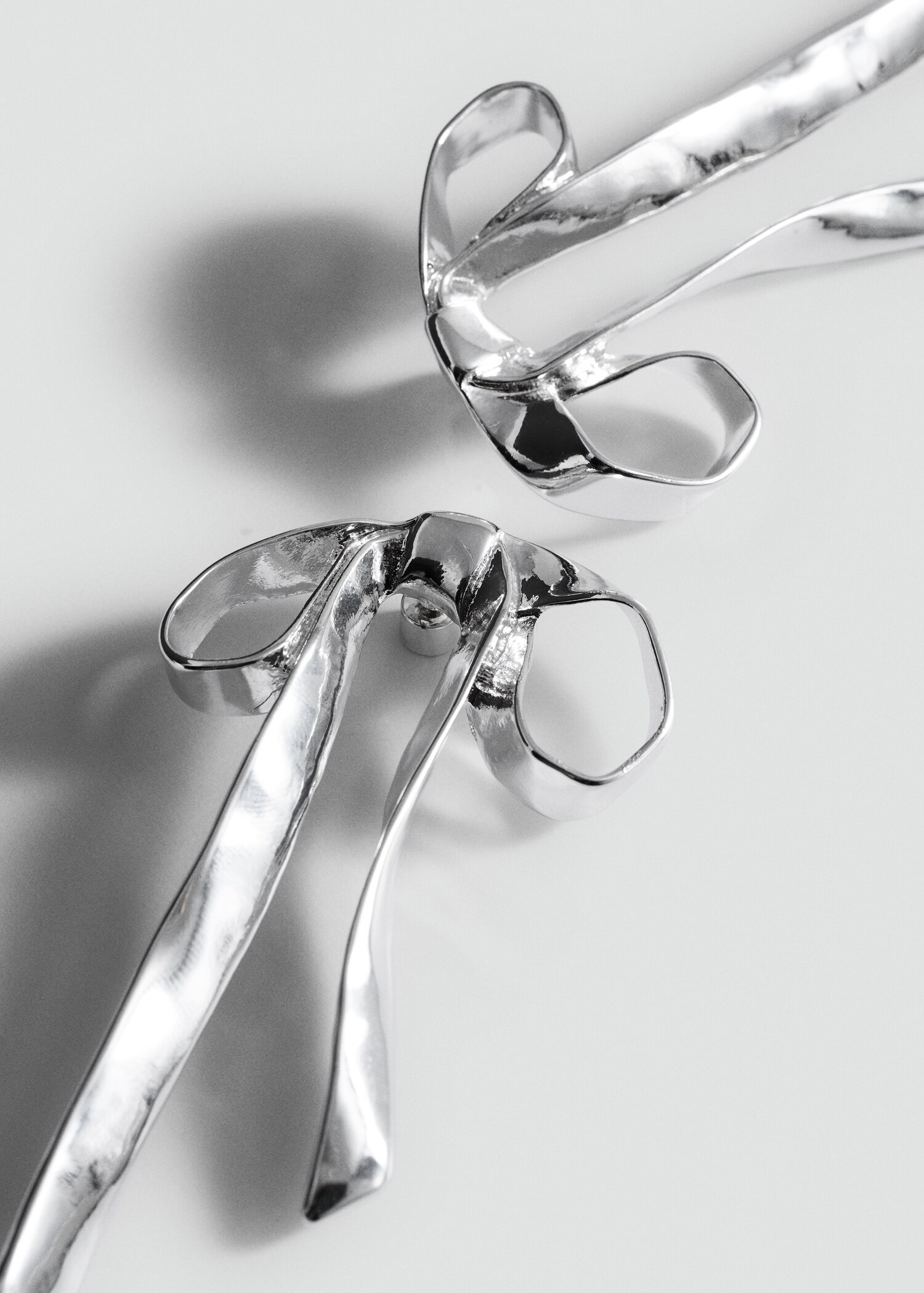 Rigid bow earrings - Medium plane