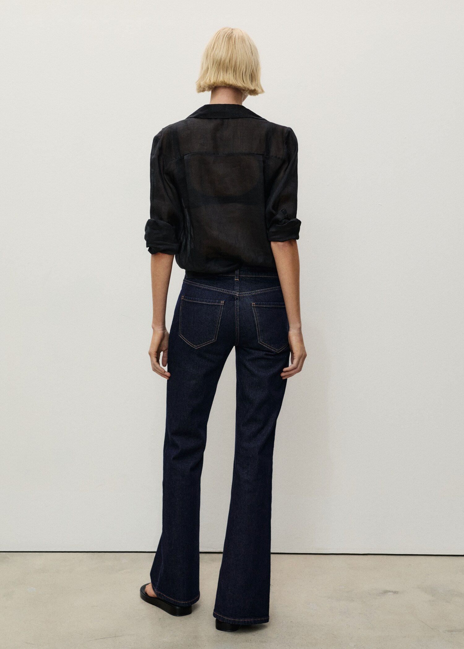 Rinse-wash flared jeans with openings - Reverse of the article