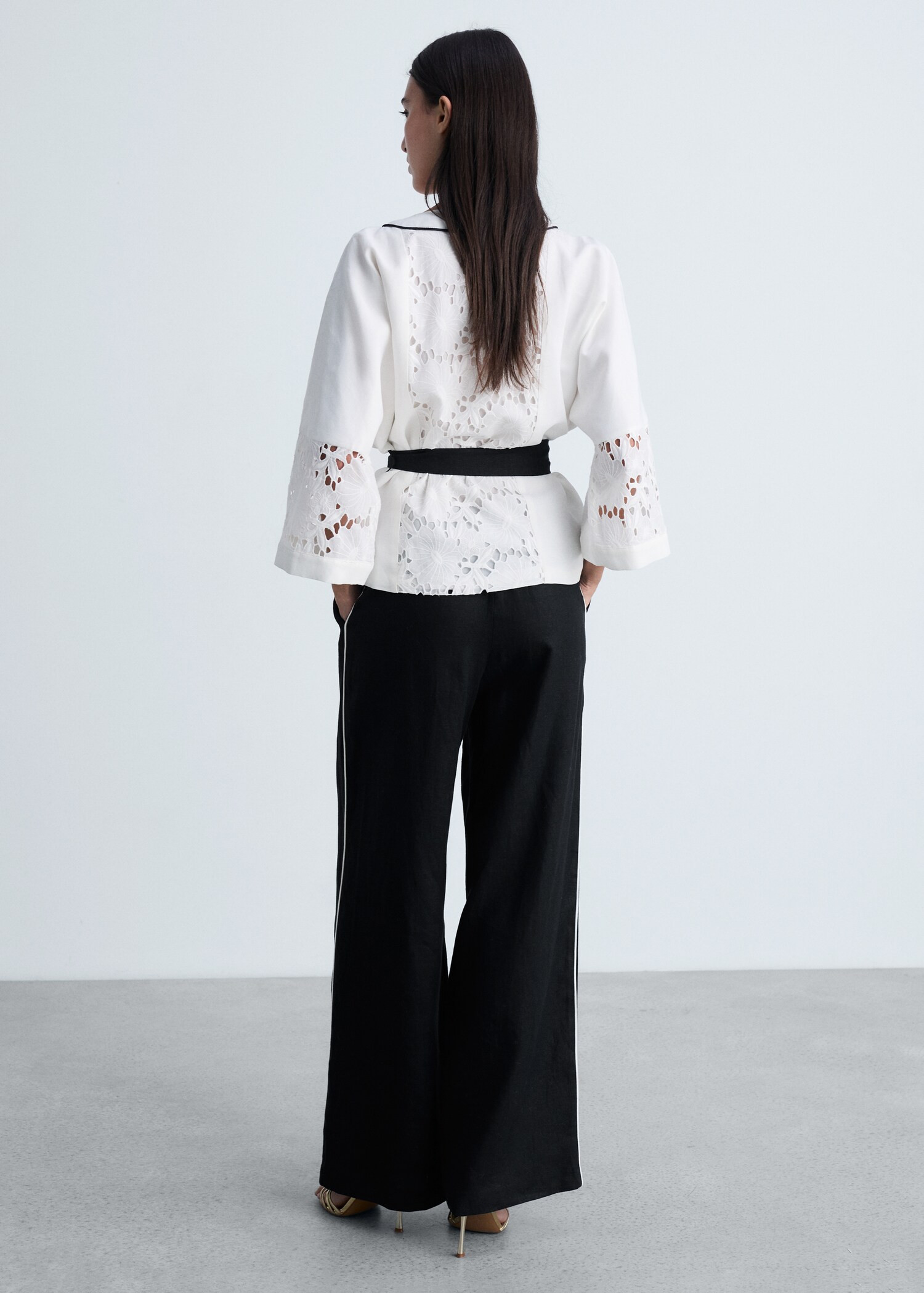 Contrast-stripe linen trousers - Reverse of the article