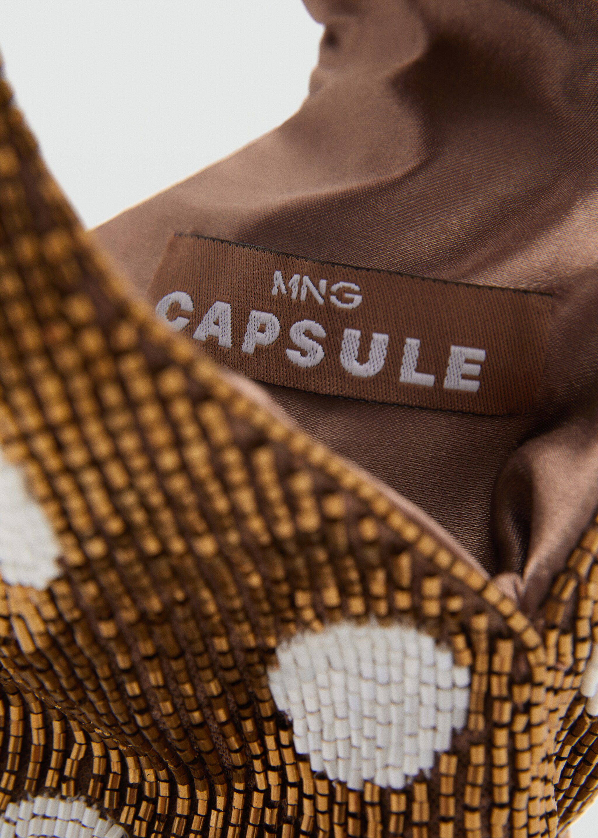 Bossa mà brodada pedreria - Detall de l'article 4, Coure. Ref: 87015753-00.