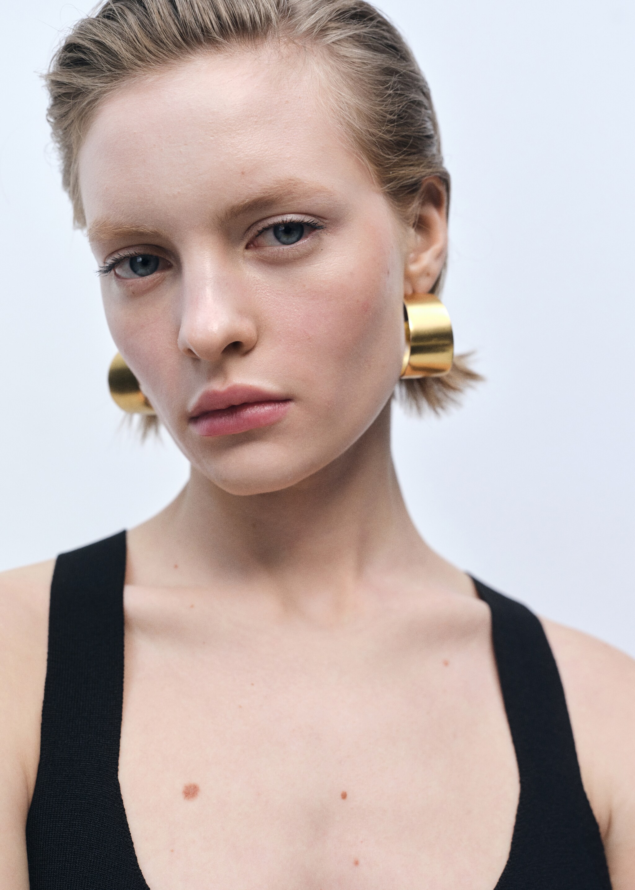 Fine-knit peplum top - Details of the article 2, Black. Ref: 87015765-00.