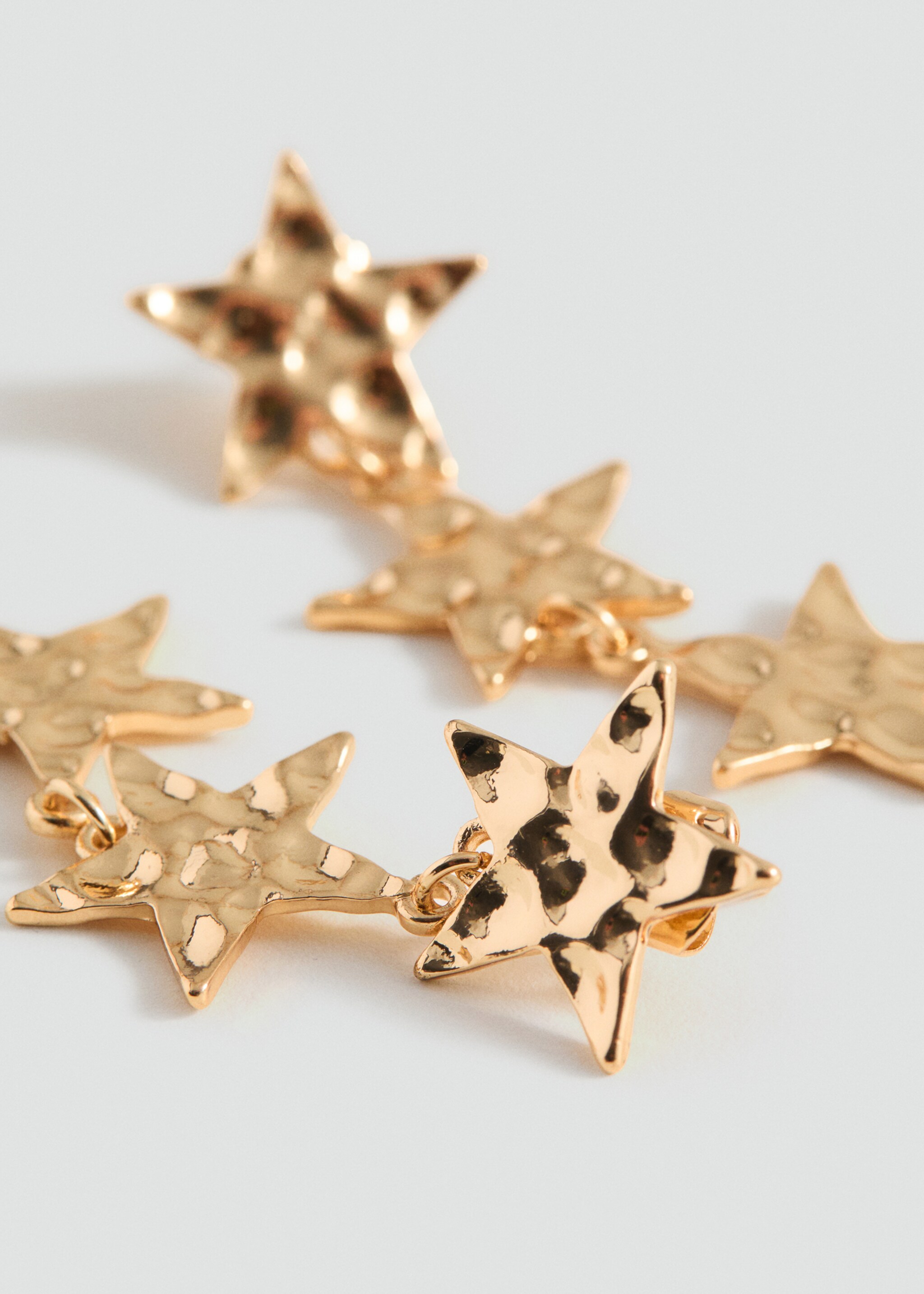 Long star earrings - Medium plane, Gold. Ref: 87020441-00.