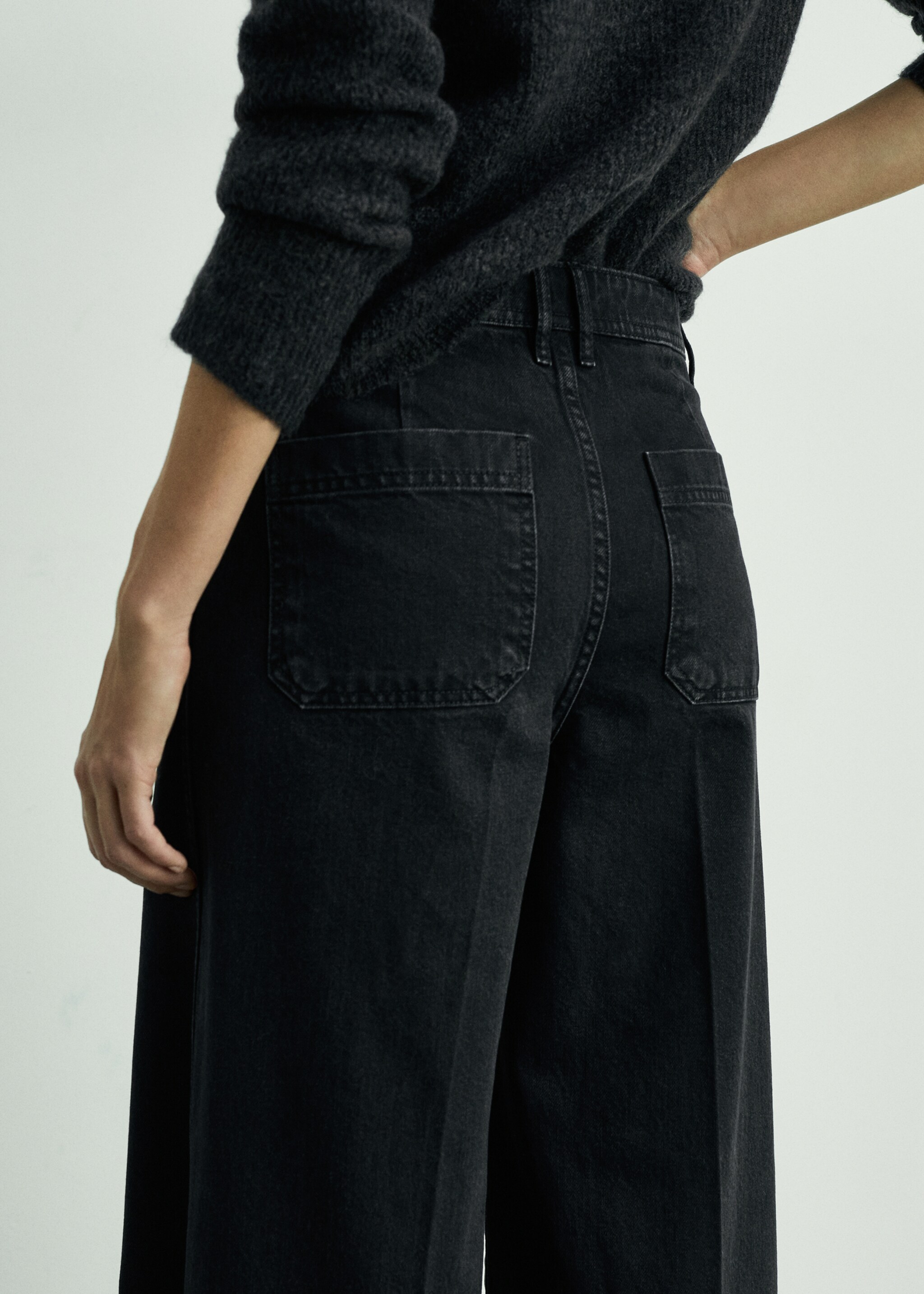 Wideleg jeans met zakken - Detail van het artikel 1, Black denim. Ref: 87020637-00.
