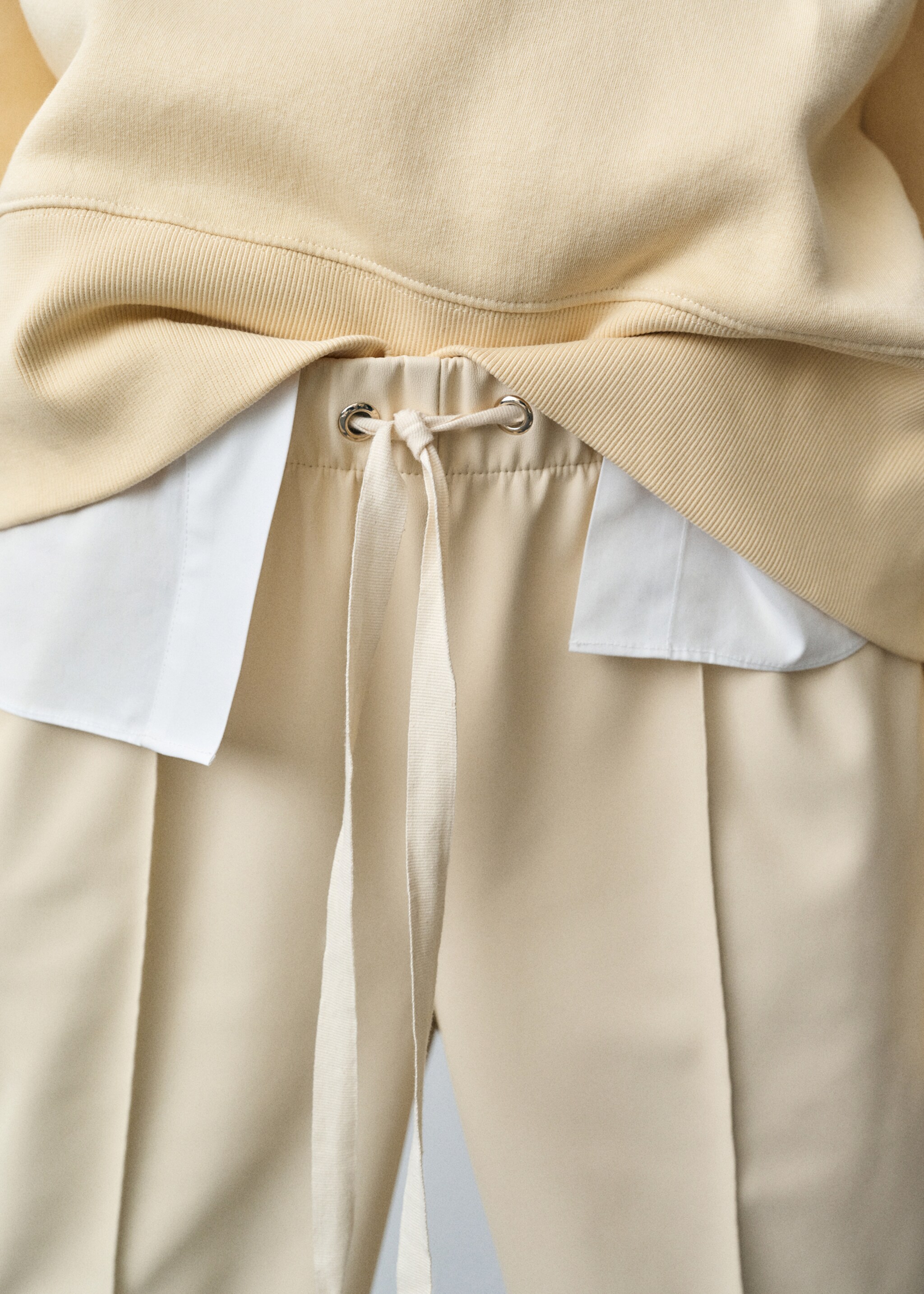 Wide leg faux-leather trousers - Details of the article 6, Ecru. Ref: 87022539-00.