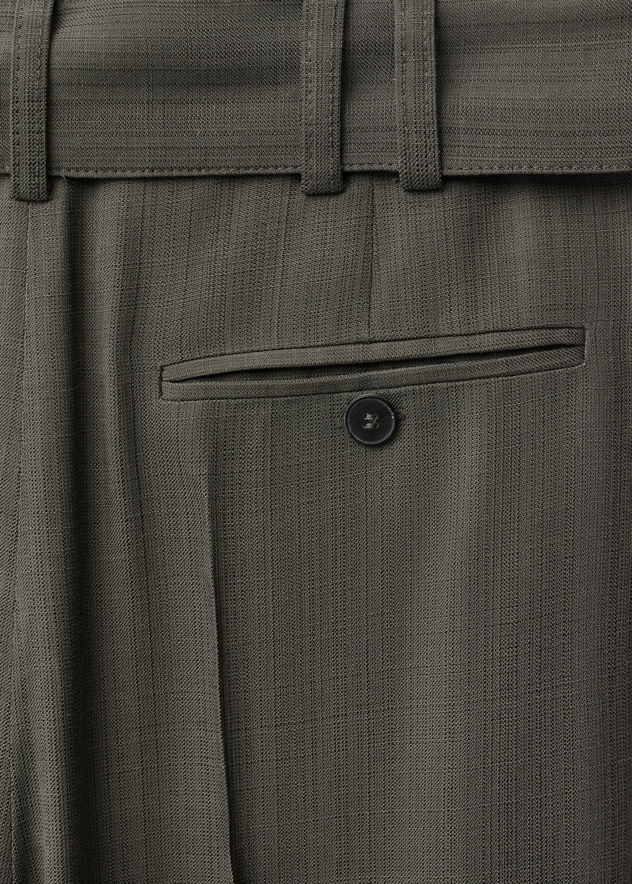 Suit trousers with belt clips - Details of the article 8, Khaki. Ref: 87024421-00.