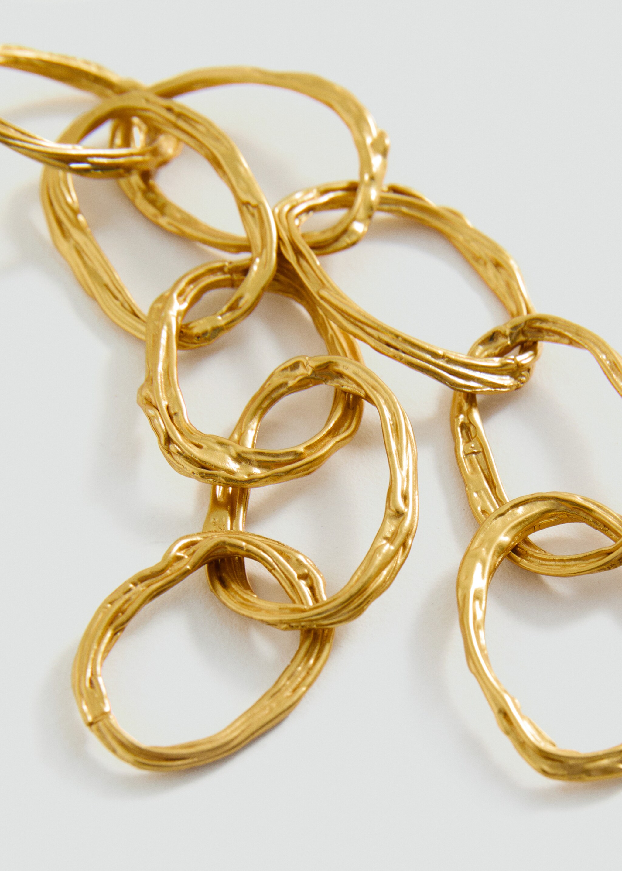 Long earrings with intertwined hoops - Details of the article 1, Gold. Ref: 87025986-00.