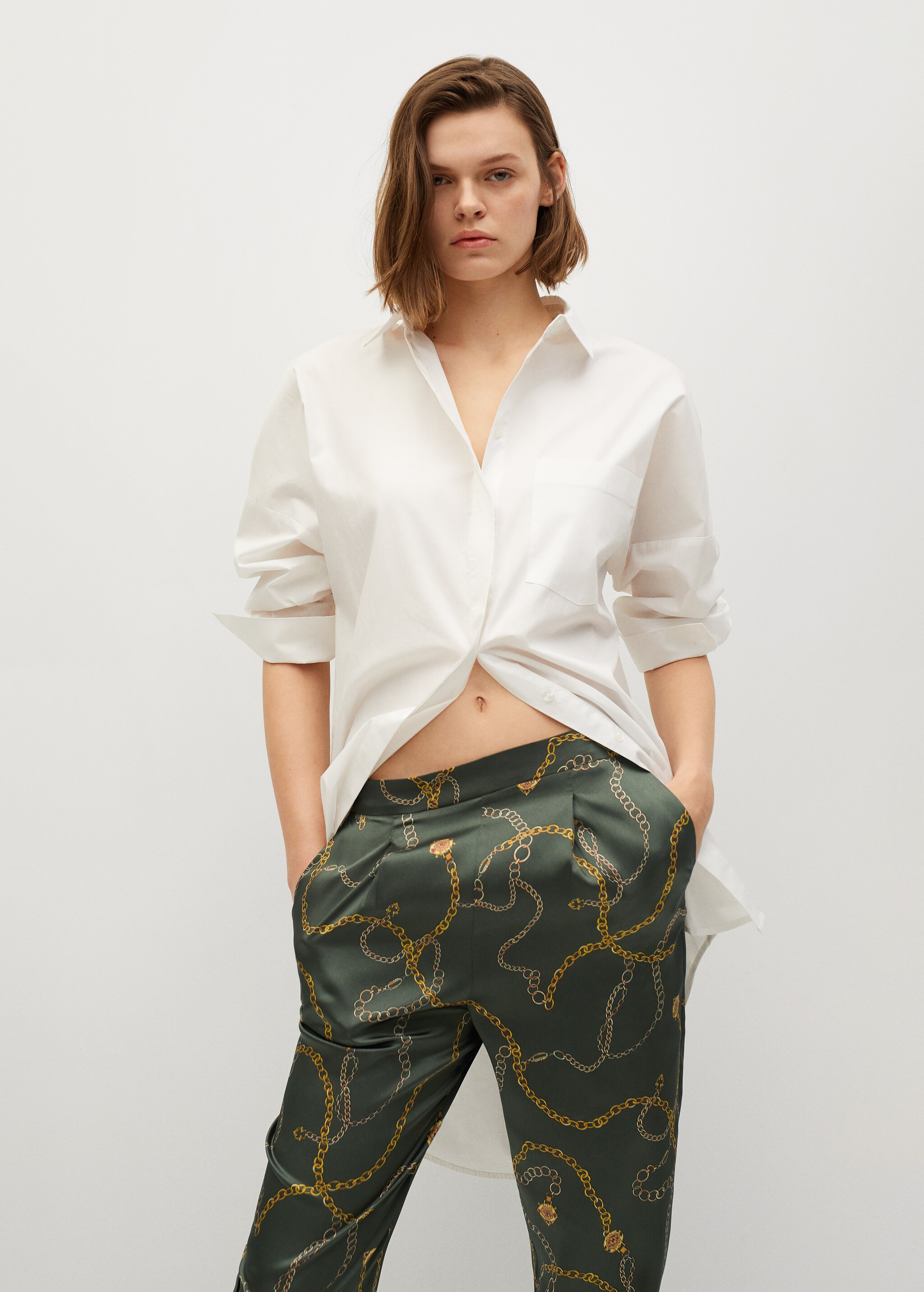 Satin-finish trousers with pleat detail  - Details of the article 1
