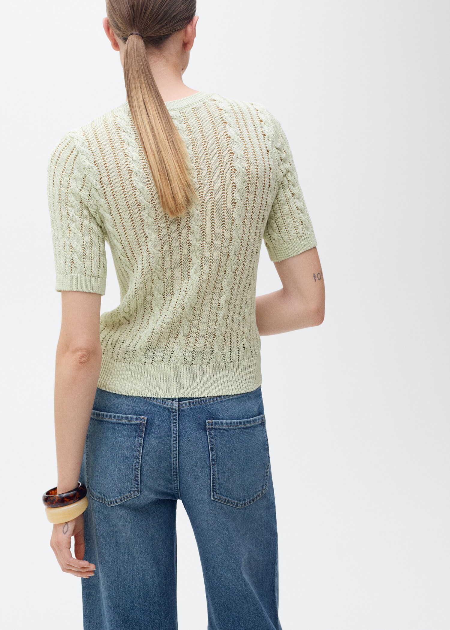 Short-sleeved cable-knit sweater - Reverse of the article