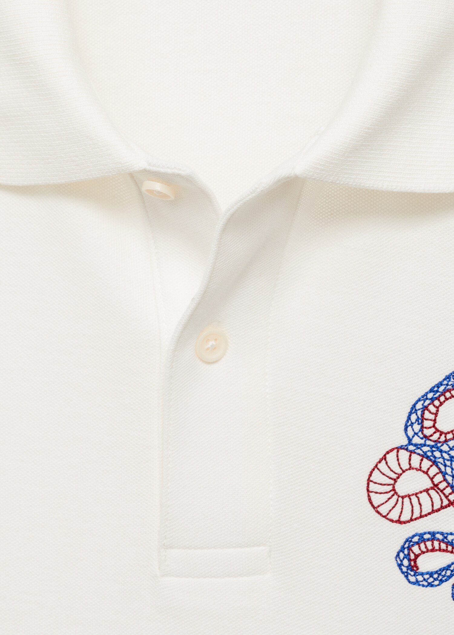 100% cotton polo shirt with embroidered graphic on the chest - Details of the article 0