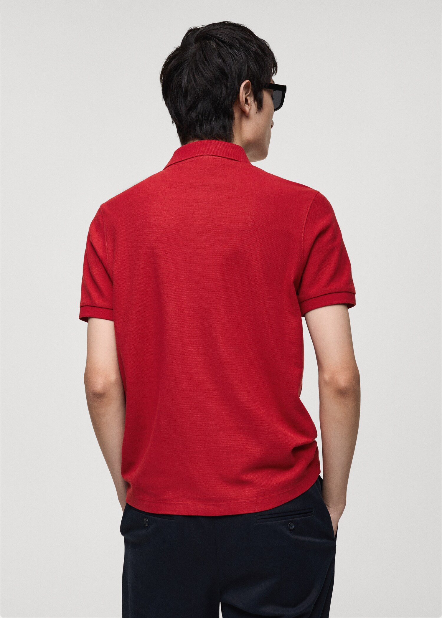 100% cotton polo shirt with embroidered graphic on the chest - Reverse of the article