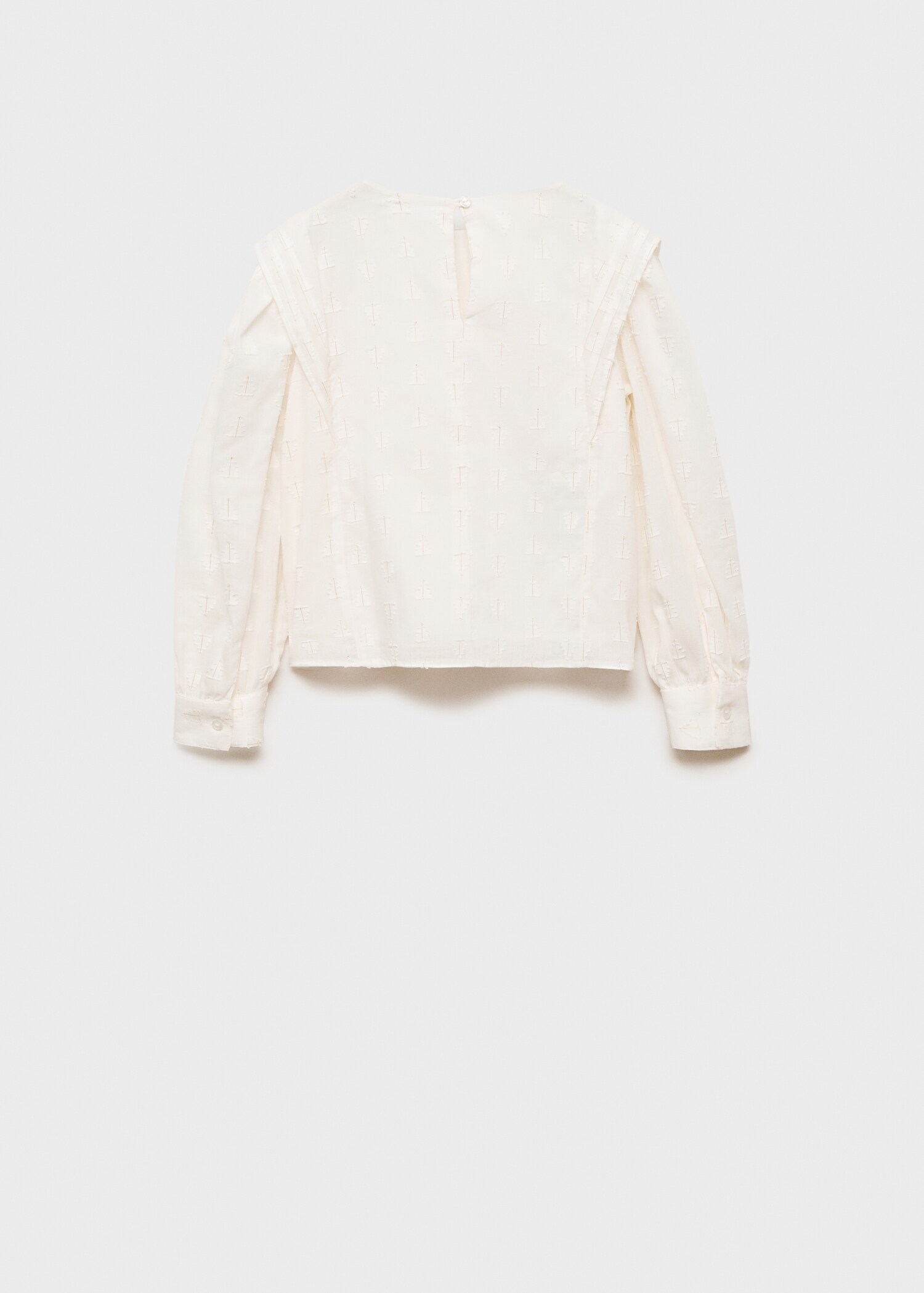 Brusa fil metal·litzat - Revers de l'article