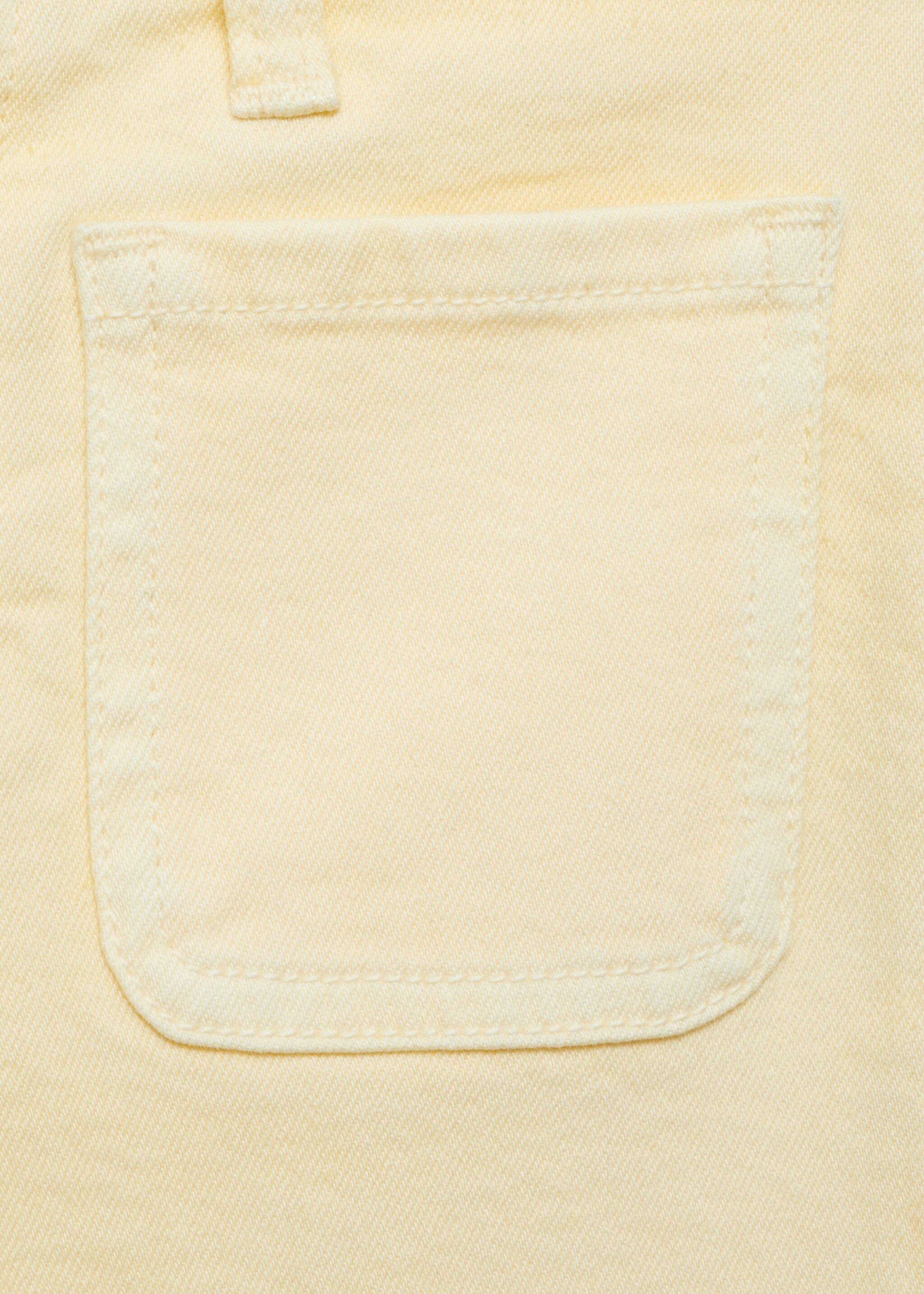 Flared jeans met zakken - Detail van het artikel 0, Pastelgeel. Ref: 87030424-00.