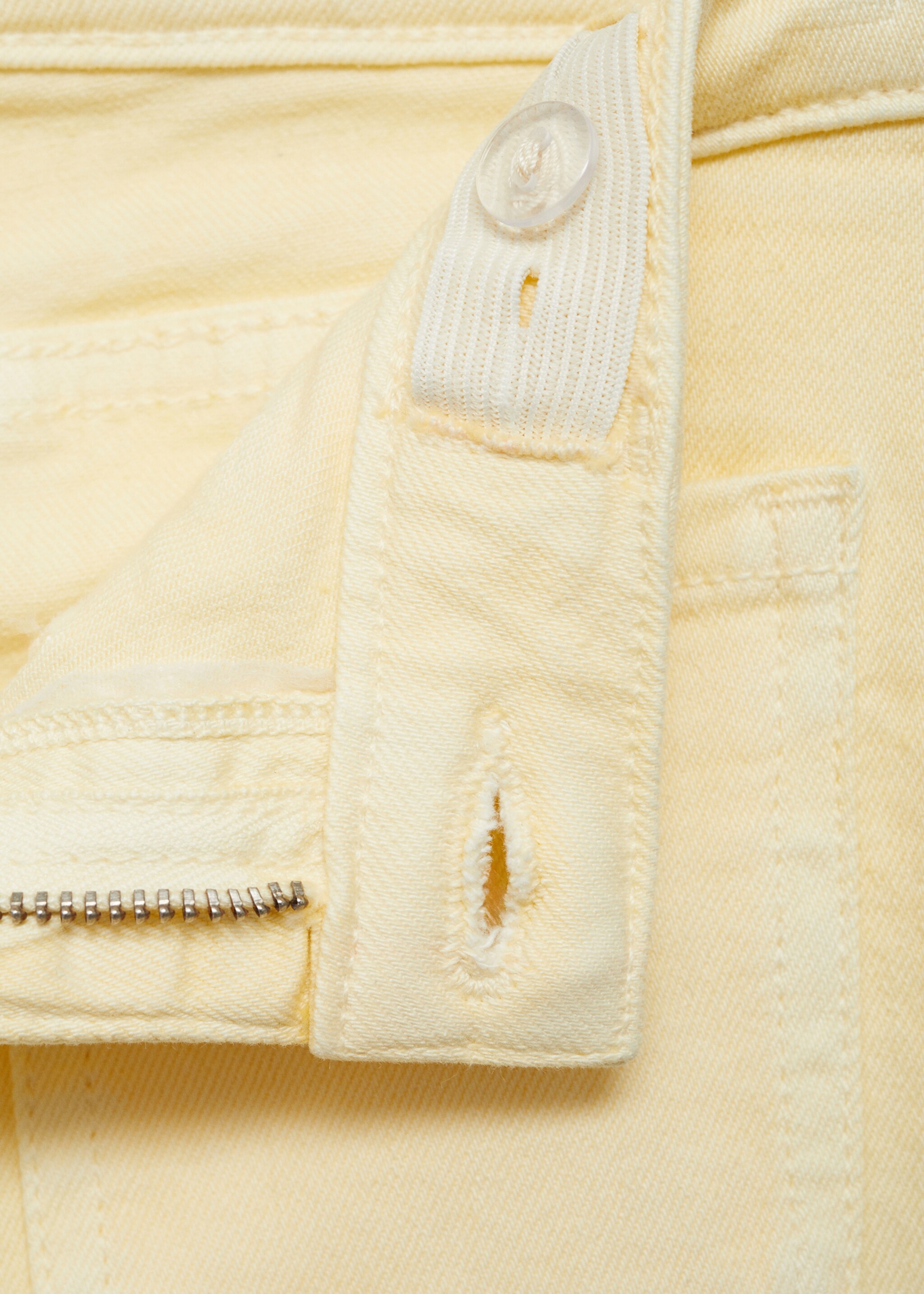 Flared jeans met zakken - Detail van het artikel 8, Pastelgeel. Ref: 87030424-00.