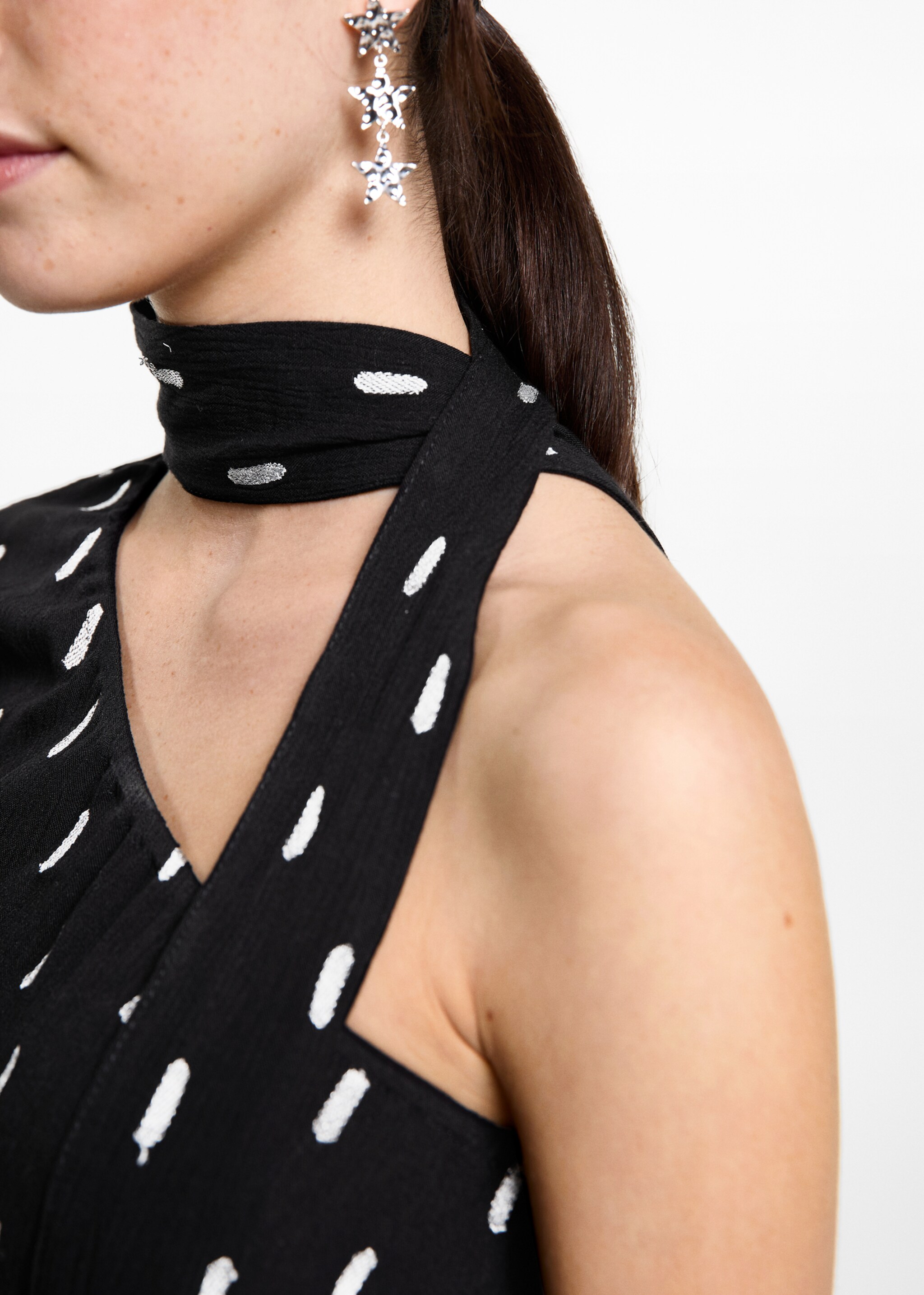 Brusa asimètrica estampada - Detall de l'article 6, Negre. Ref: 87030430-00.