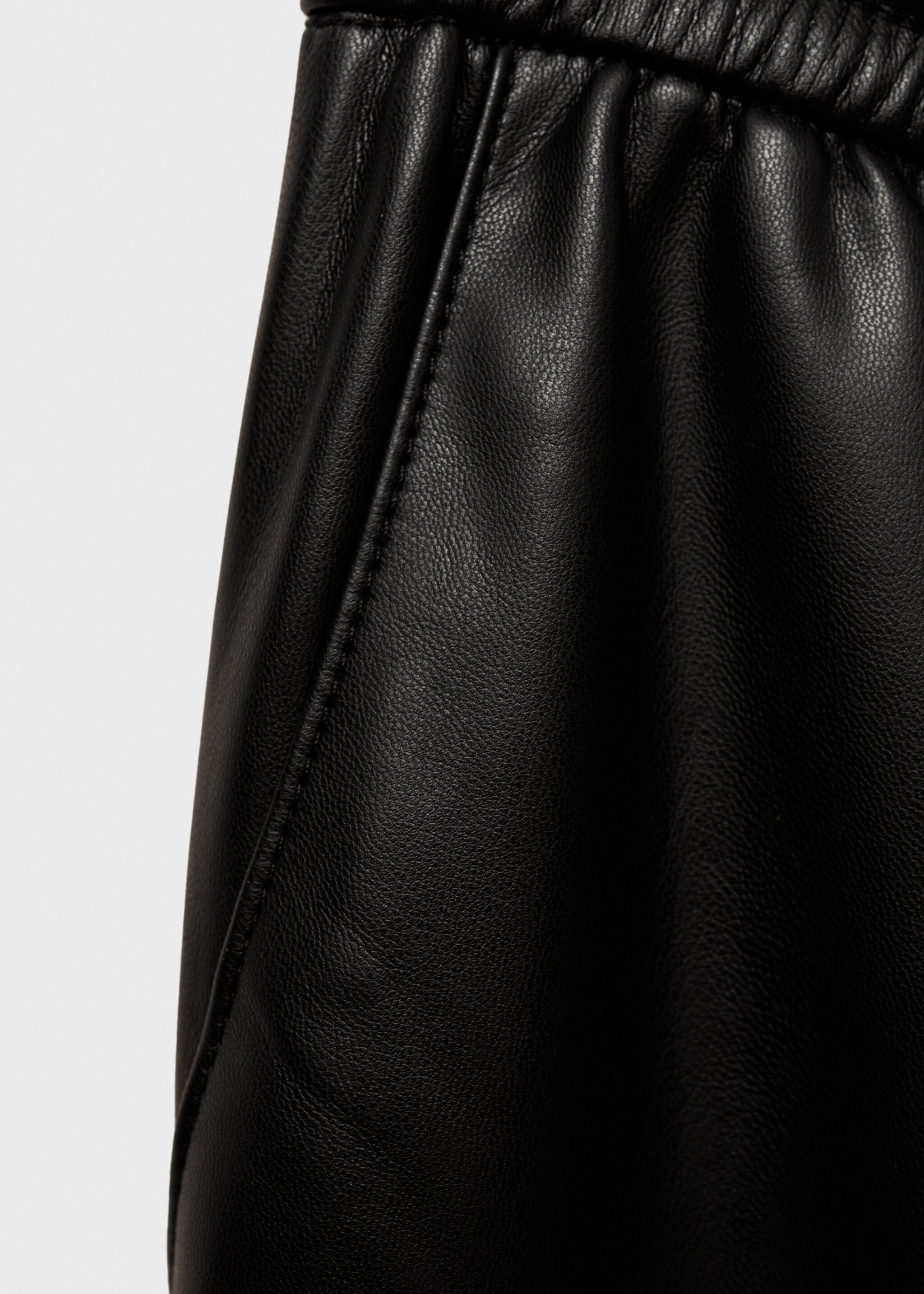 Faux-leather trousers with elastic waist - Details of the article 0, Black. Ref: 87030436-00.