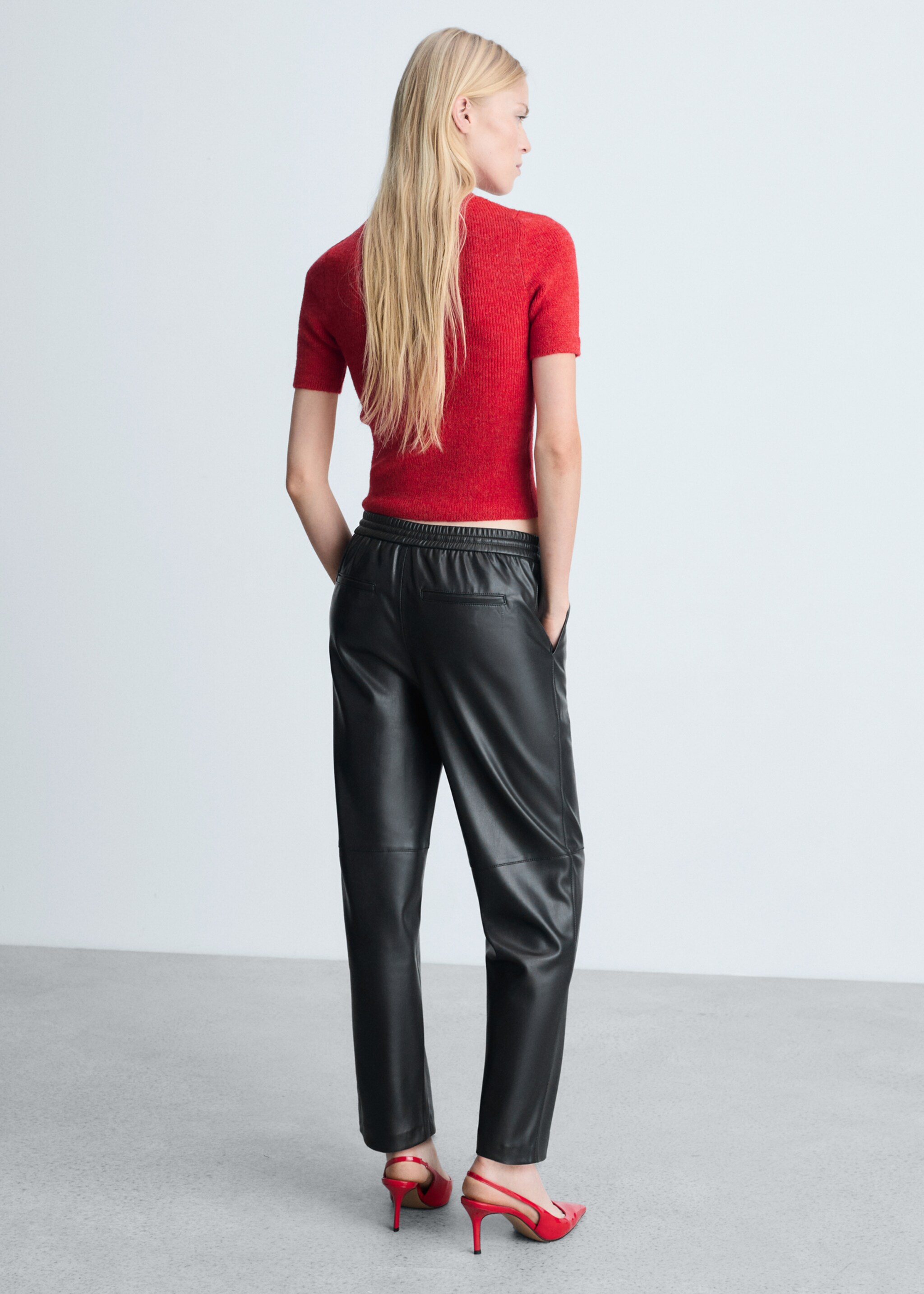 Faux-leather trousers with elastic waist - Reverse of the article, Black. Ref: 87030436-00.