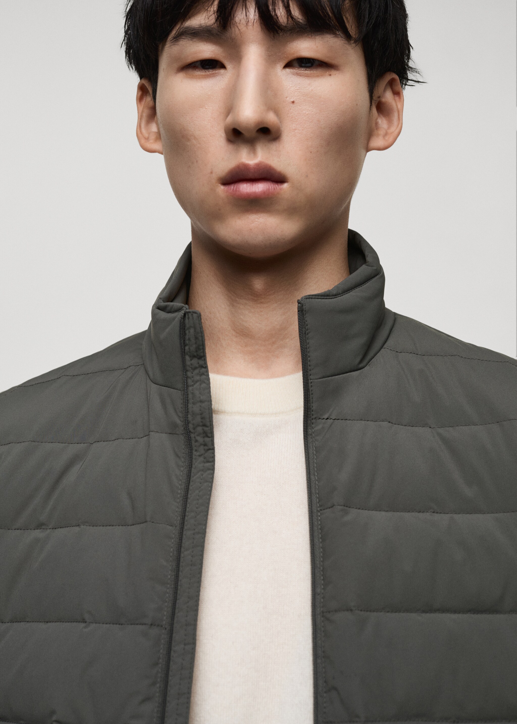 Quilted waistcoat with down and feather filling - Details of the article 1, Grey. Ref: 87030576-00.